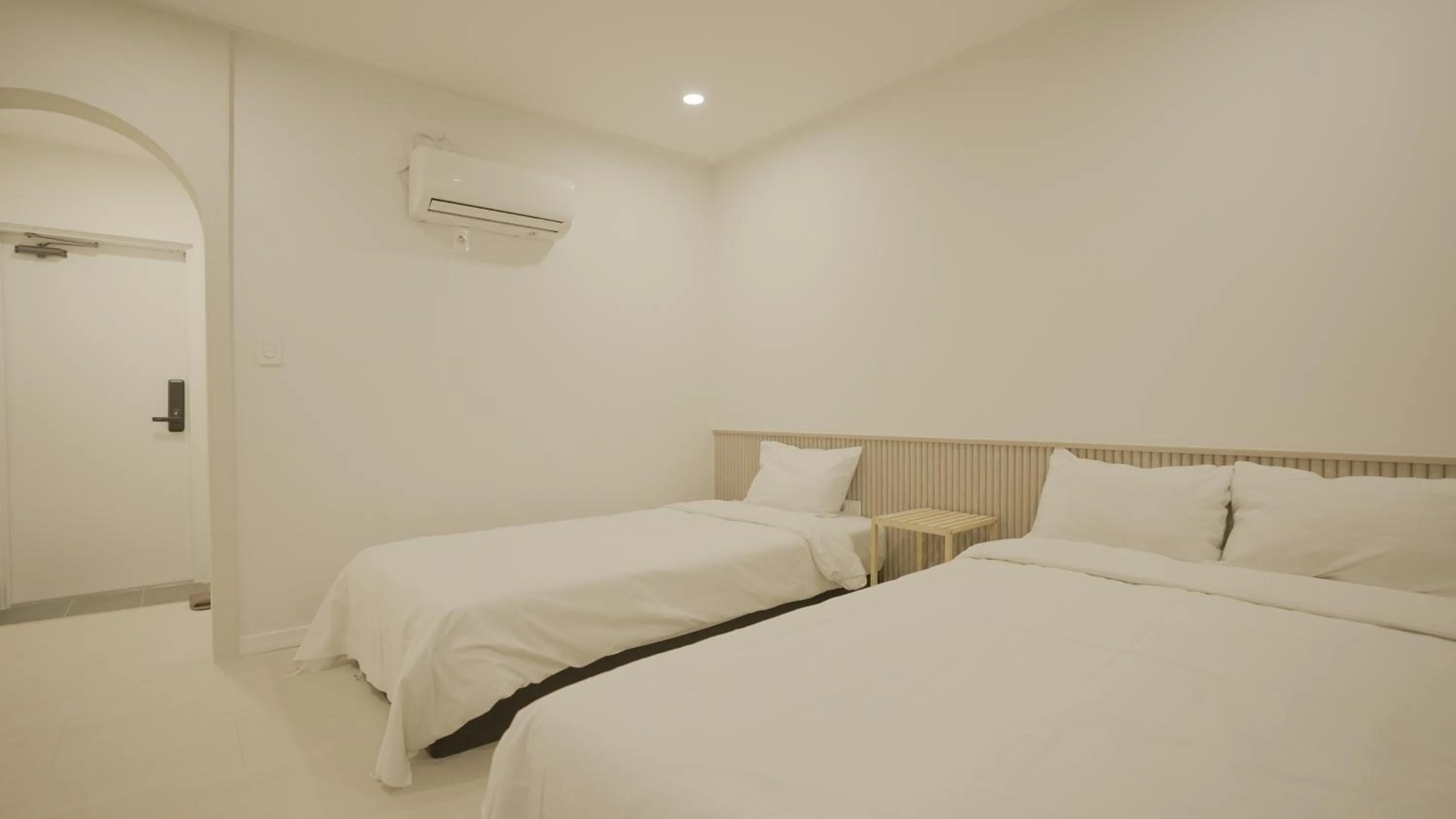 Bed in Jeju Stay Hotel