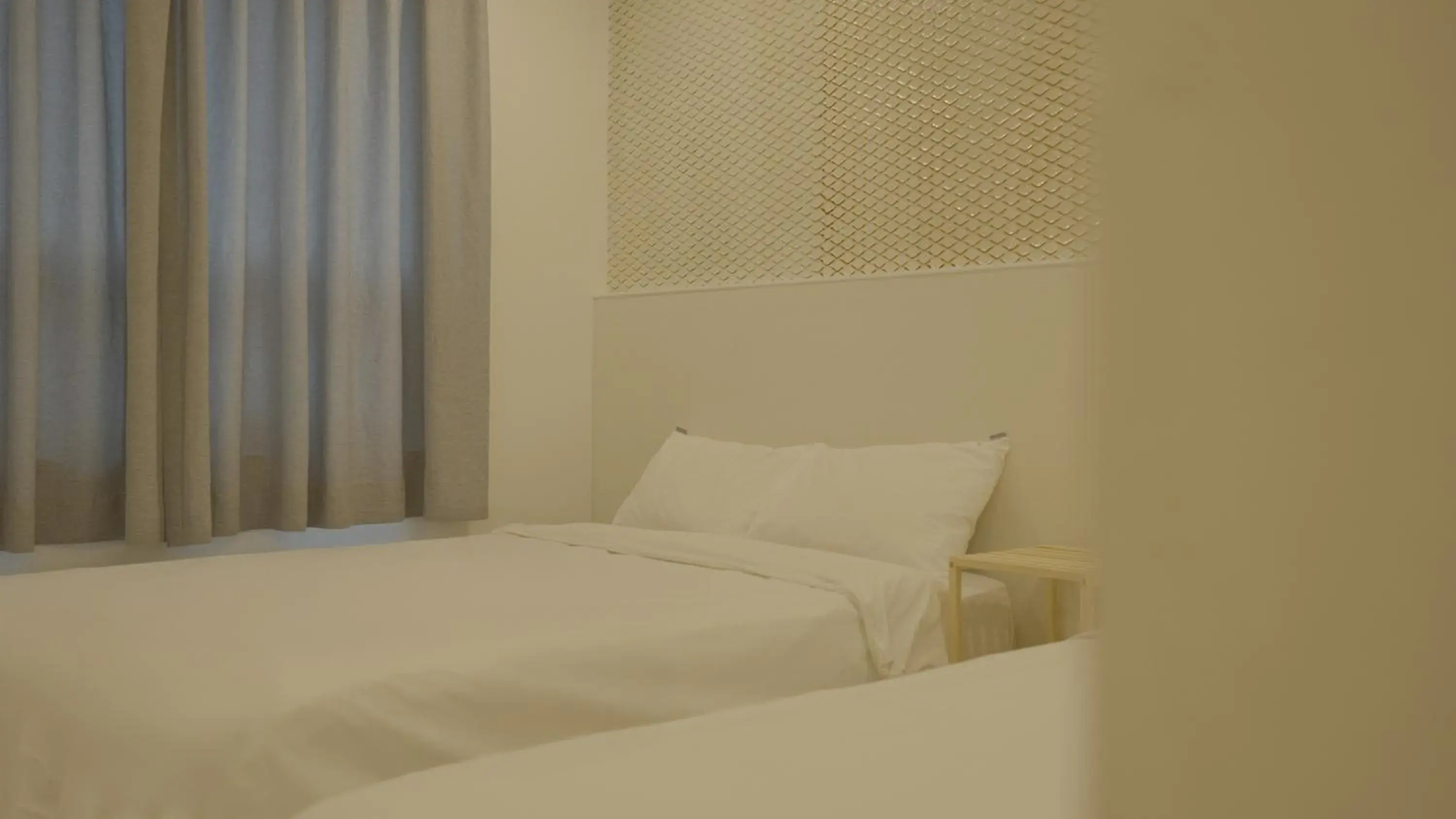 Bed in Jeju Stay Hotel Bed in Jeju Stay Hotel