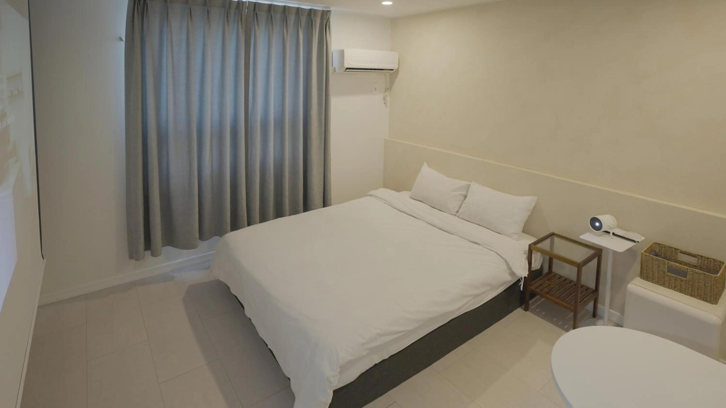 Bed in Jeju Stay Hotel