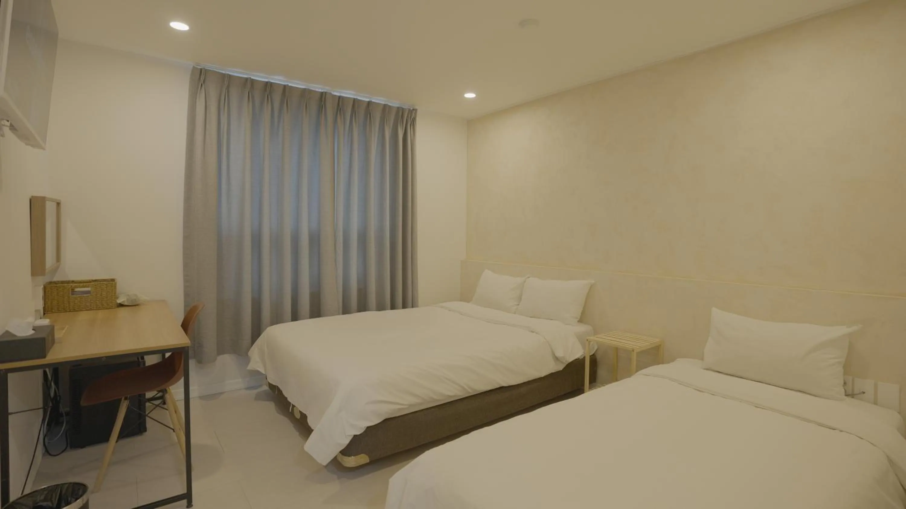 Bed in Jeju Stay Hotel