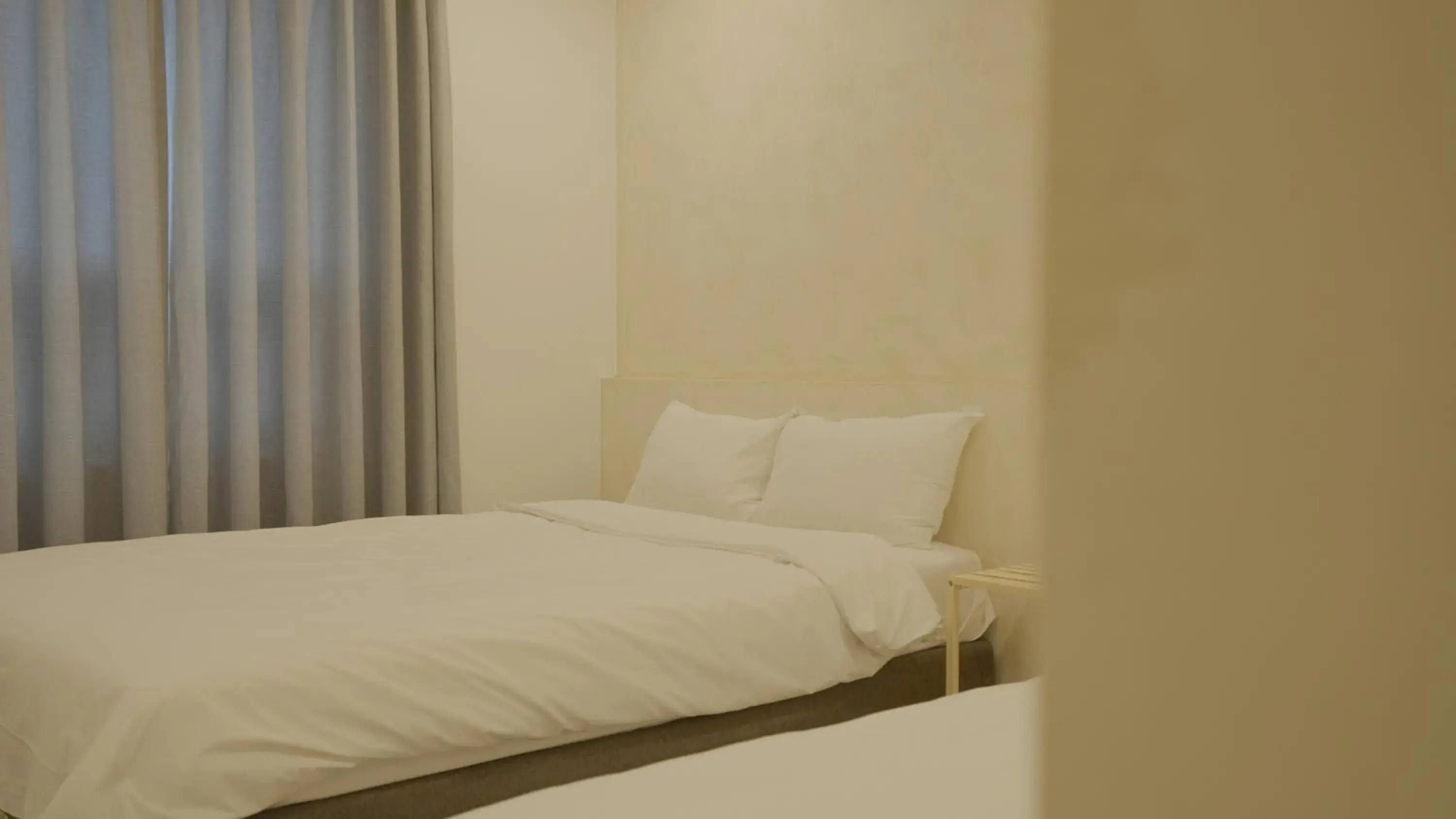 Bed in Jeju Stay Hotel Bed in Jeju Stay Hotel