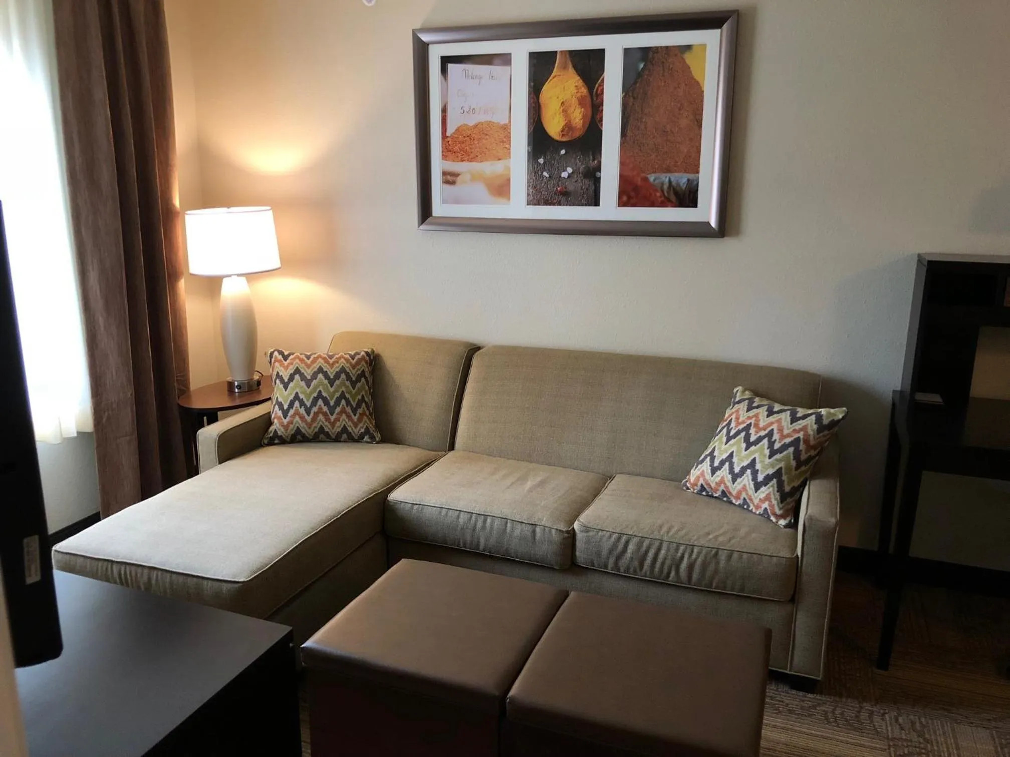 Living room in Staybridge Suites Grand Rapids-Kentwood by IHG