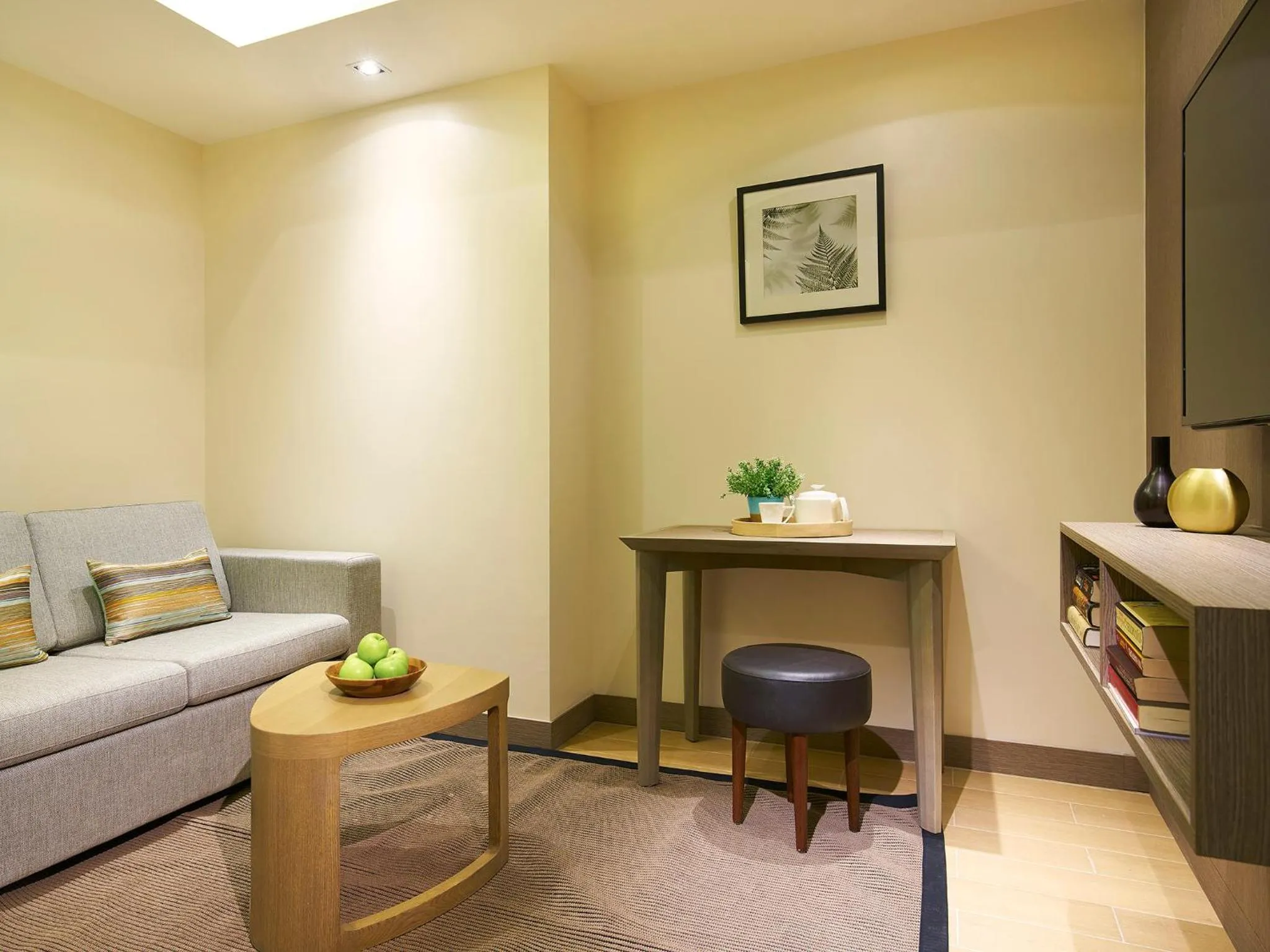 Living room, Bed in Oasia Residence Singapore by Far East Hospitality