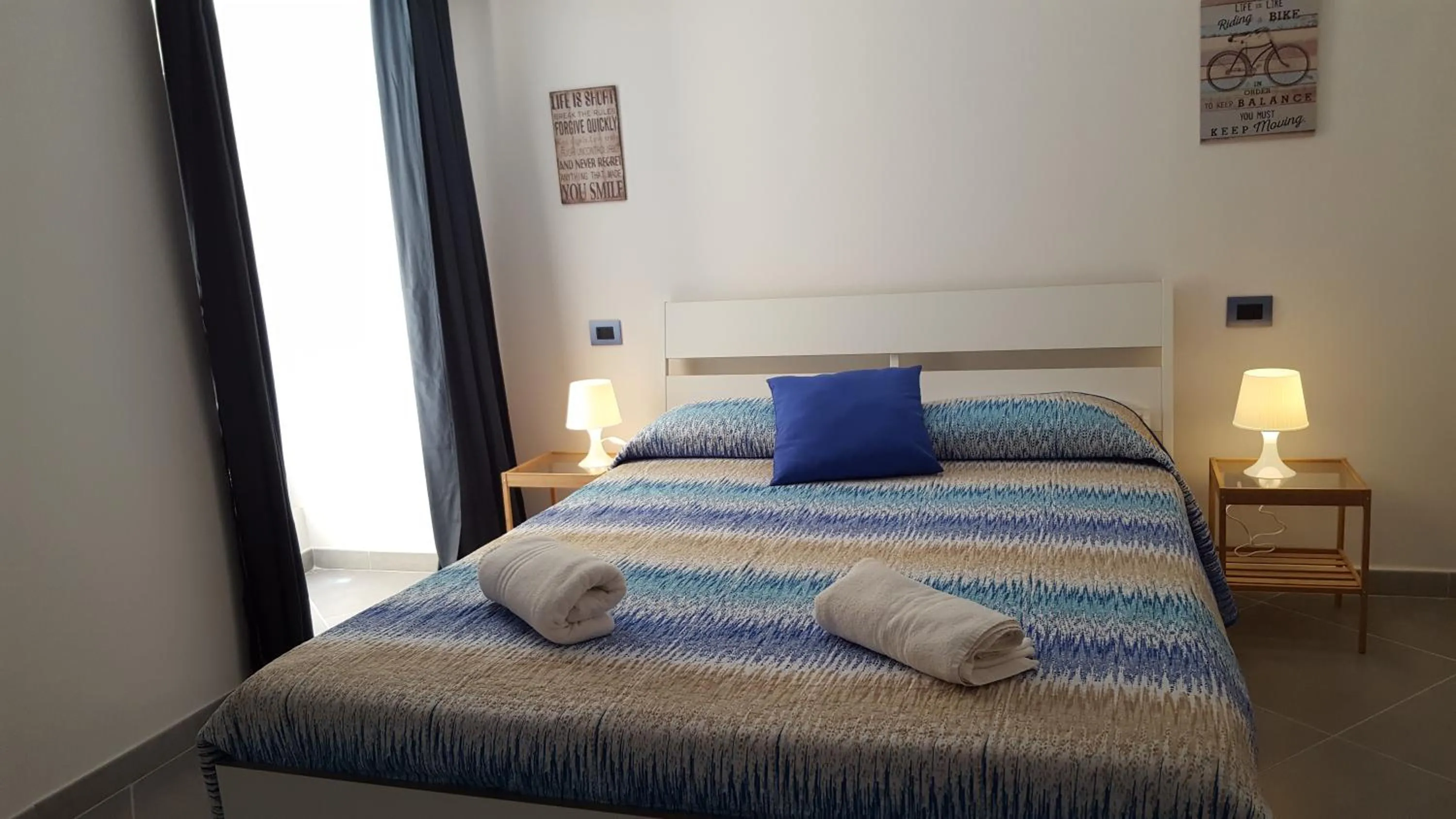 Photo of the whole room, Bed in Hello World