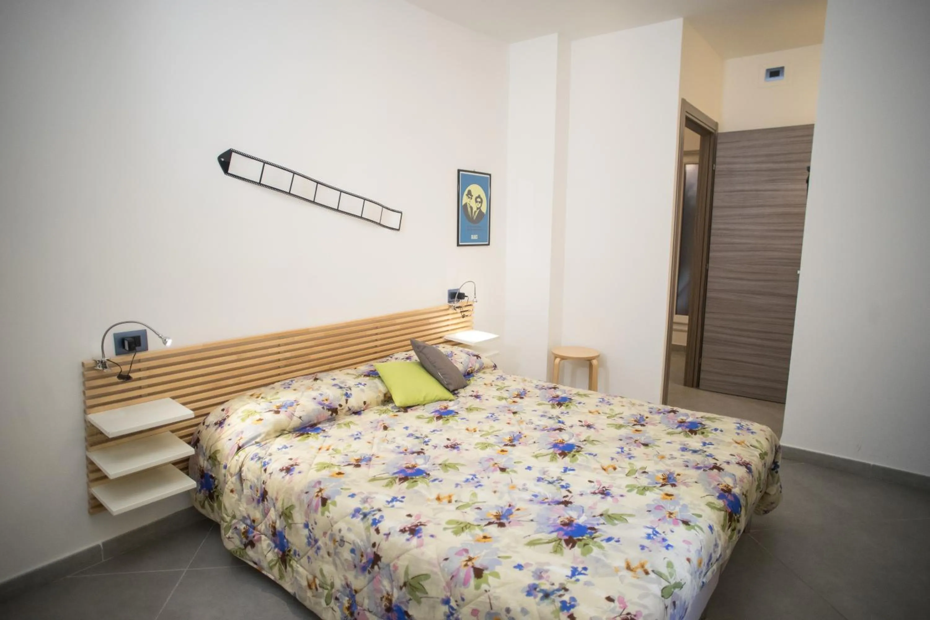 Photo of the whole room, Bed in Hello World