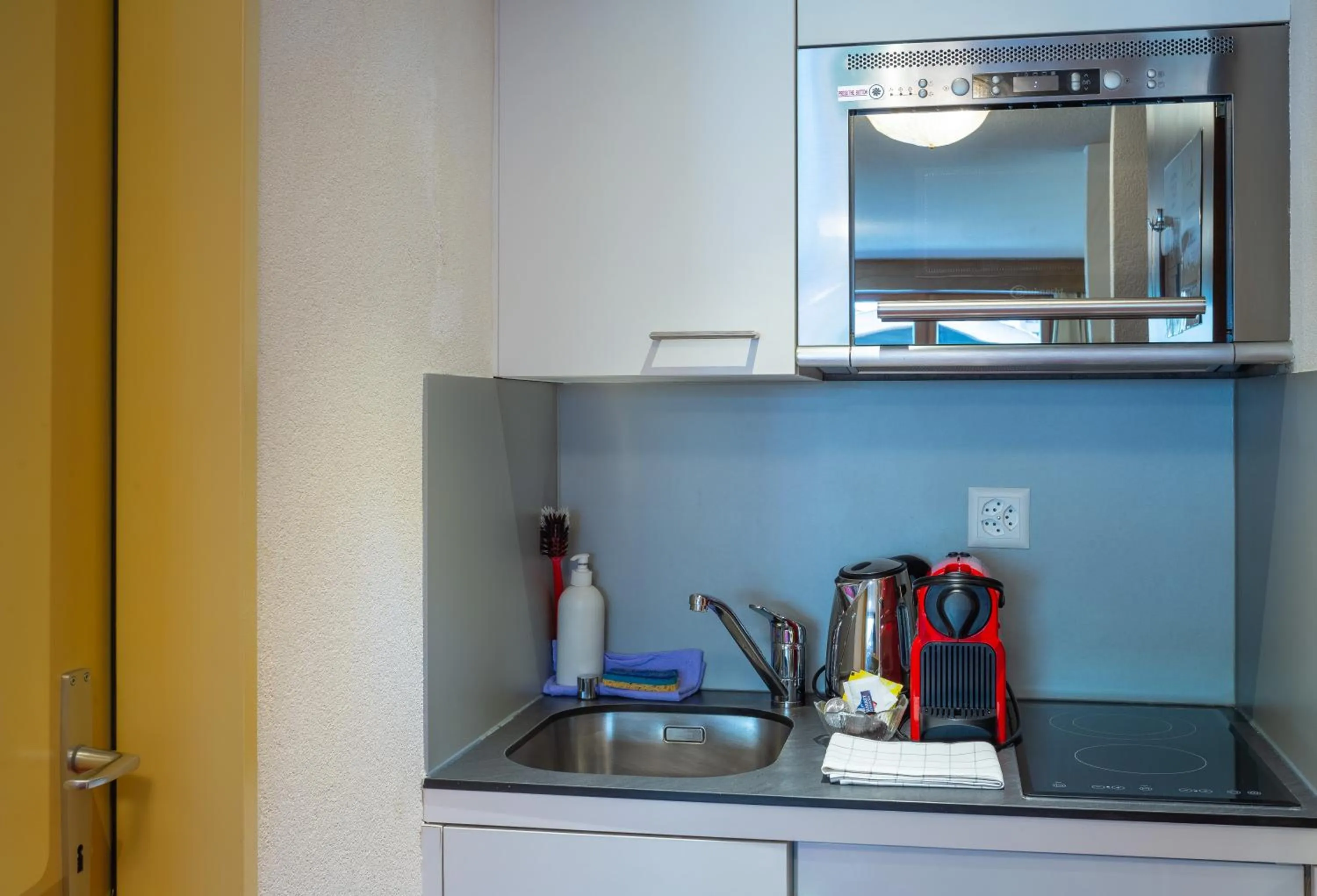 Kitchen or kitchenette in Arca Aparthotel & Spa