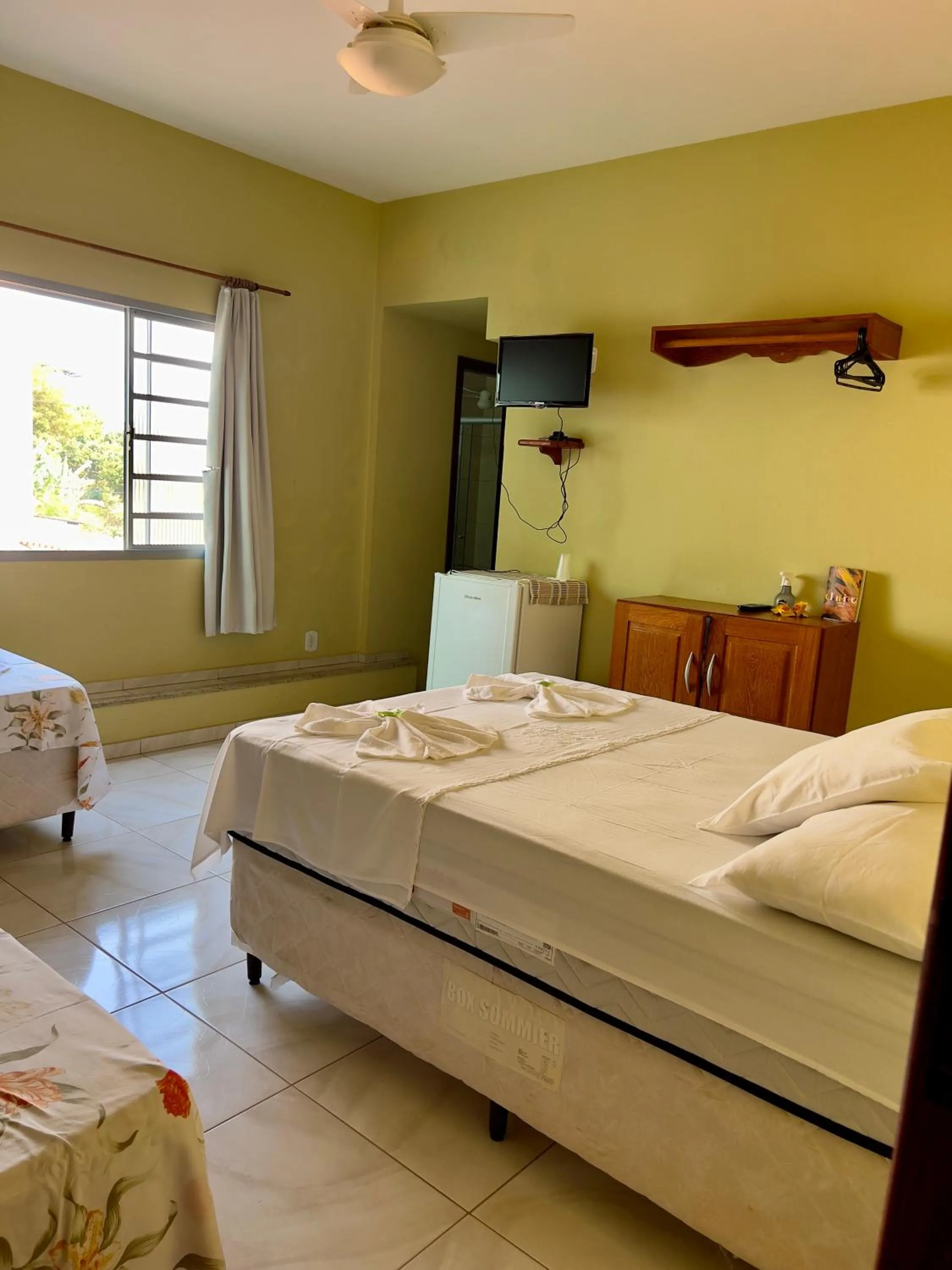 Bed in Pousada dos Contos de Carrancas