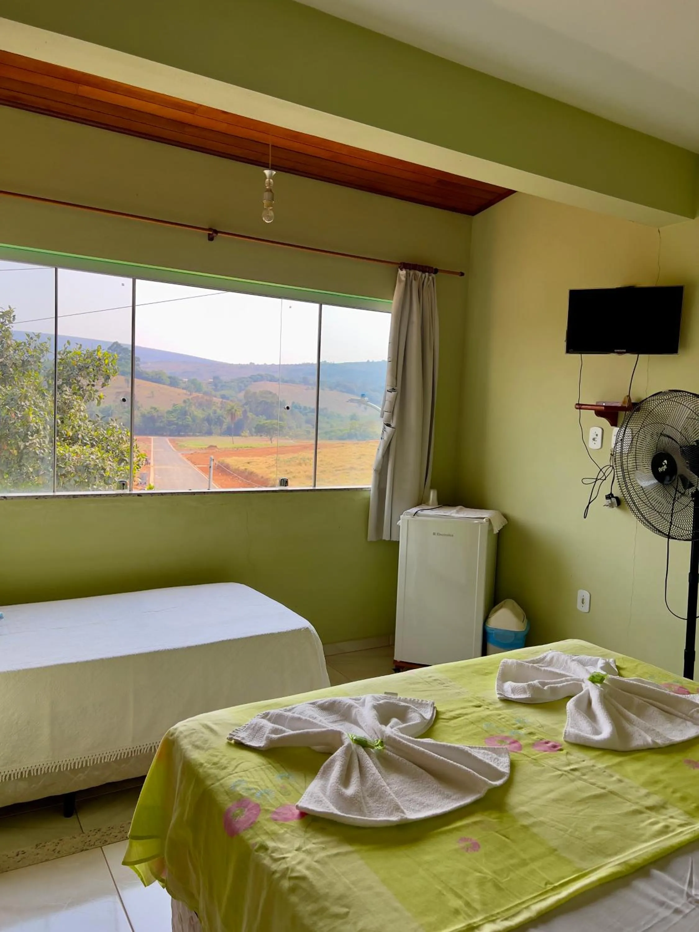 Bed in Pousada dos Contos de Carrancas