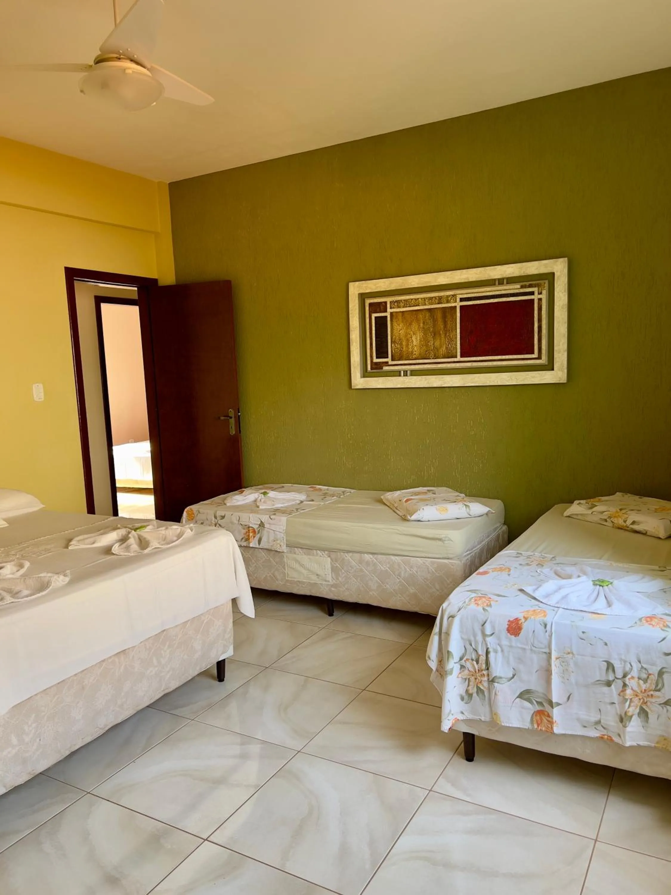 Bed in Pousada dos Contos de Carrancas