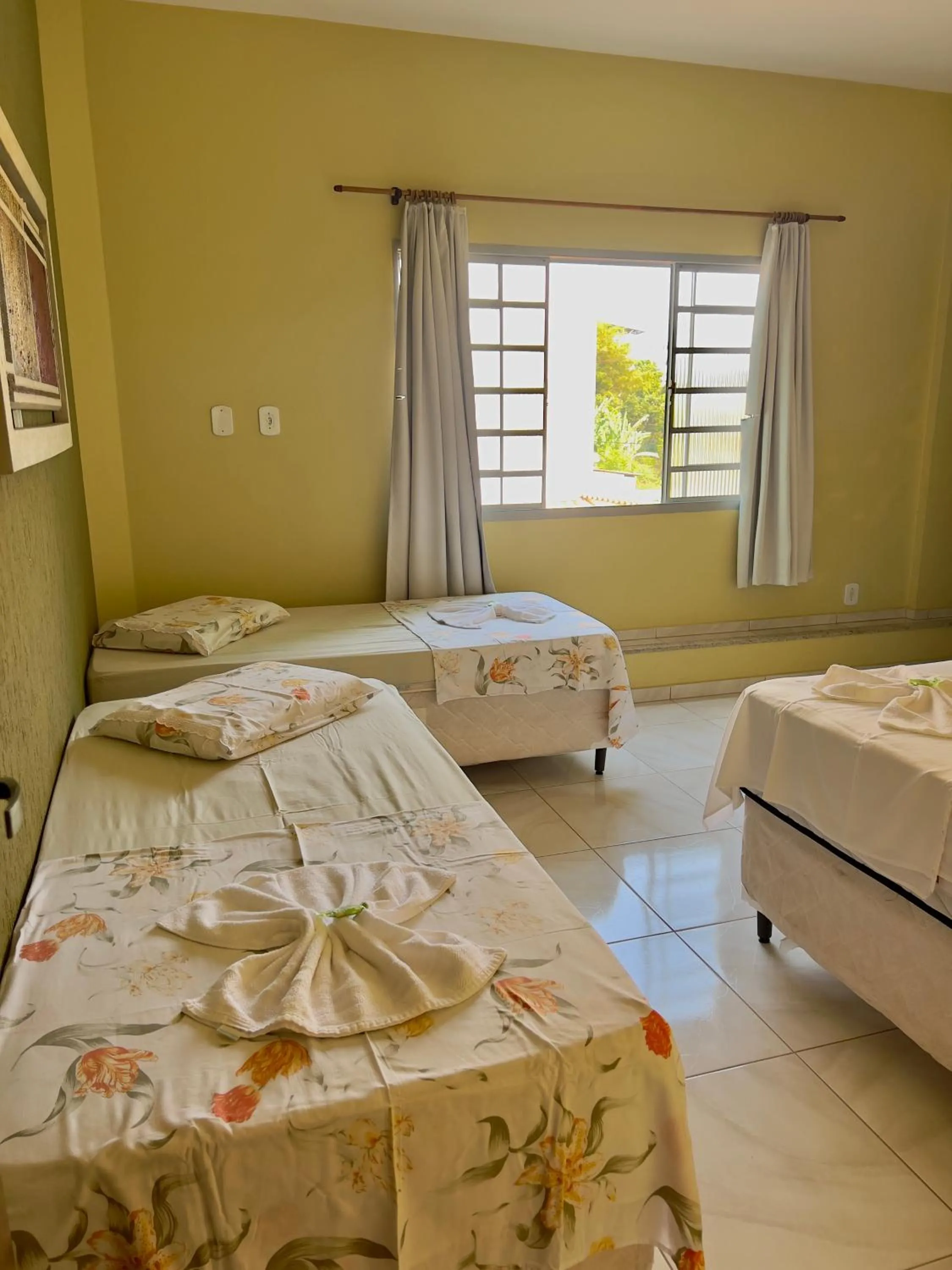 Bed in Pousada dos Contos de Carrancas