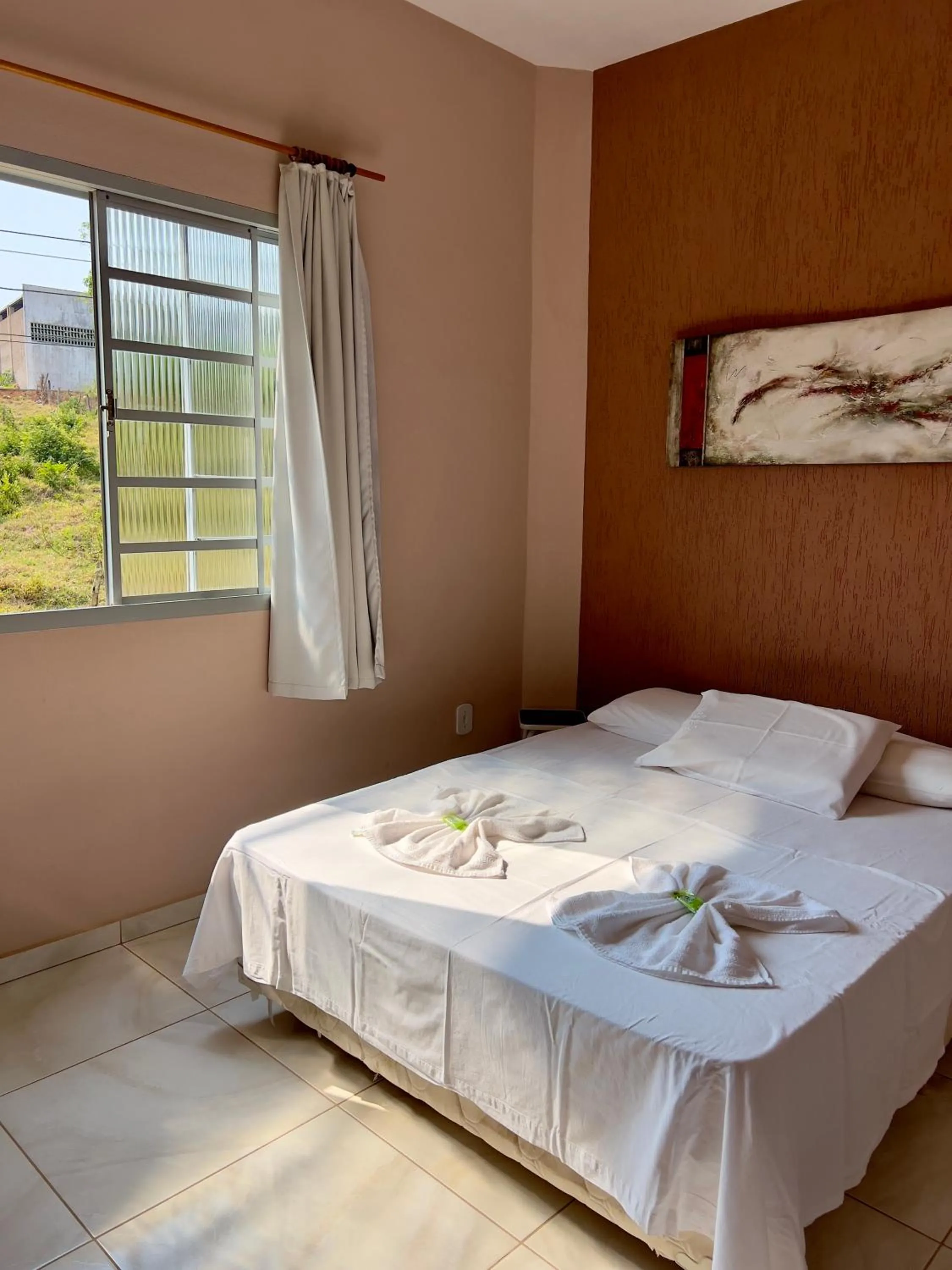 Bed in Pousada dos Contos de Carrancas