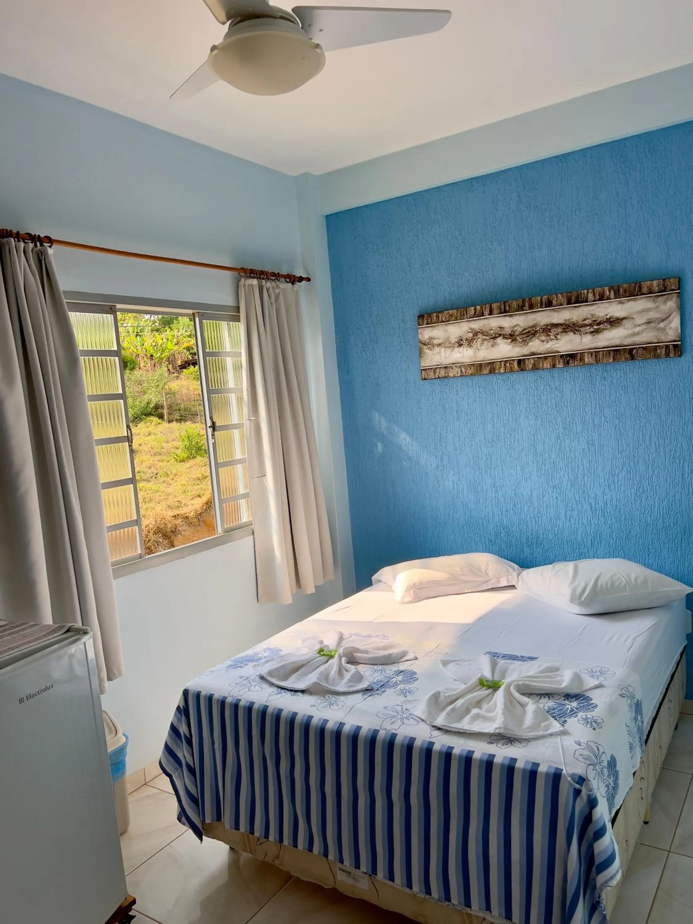 Bed in Pousada dos Contos de Carrancas