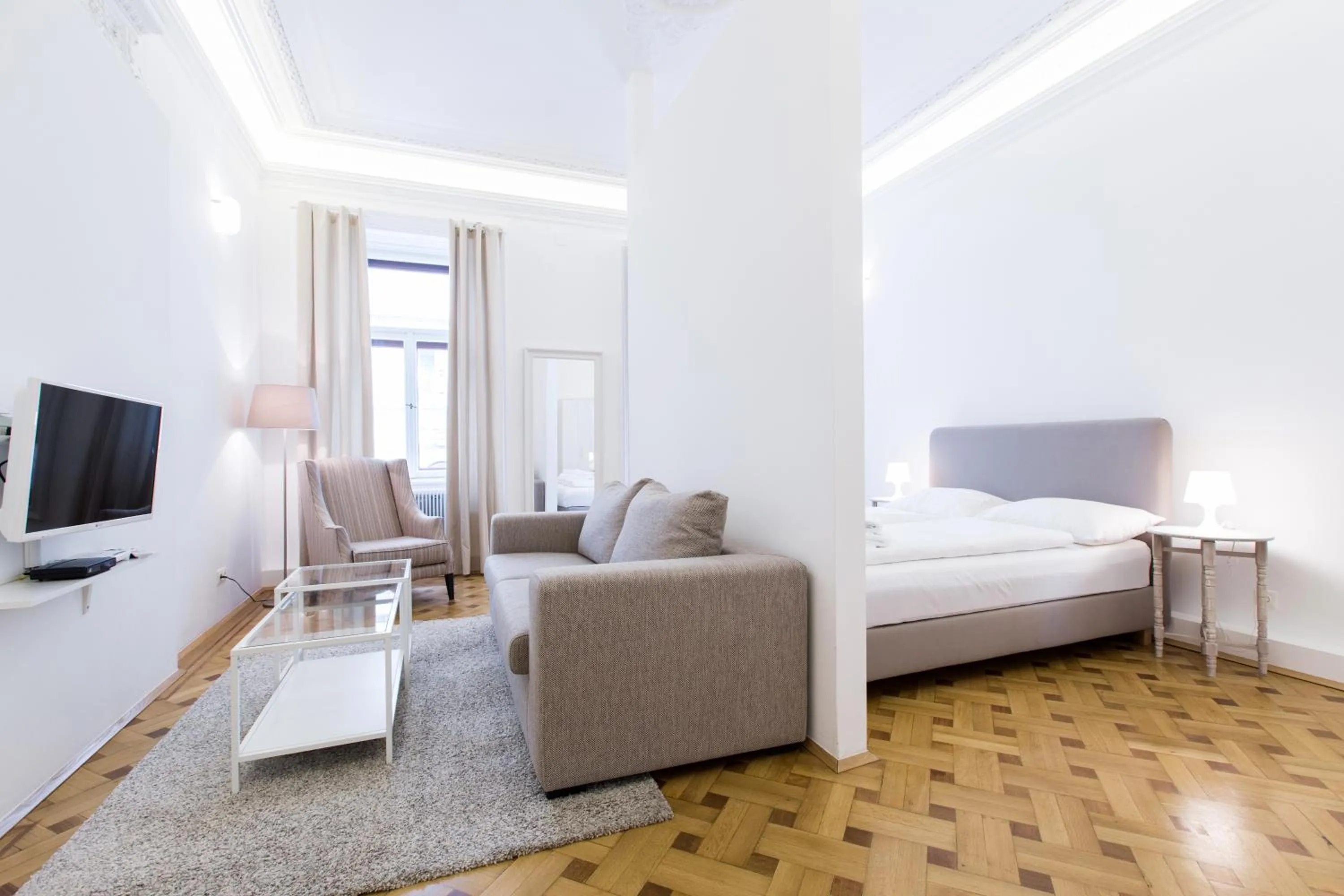 Photo of the whole room, Bed in HeyMi Apartments in City Center