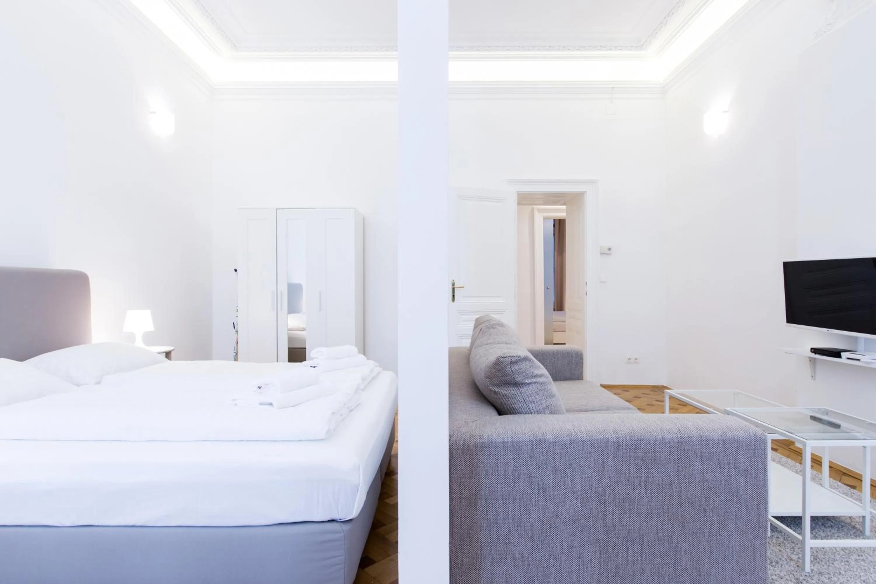 Photo of the whole room, Bed in HeyMi Apartments in City Center