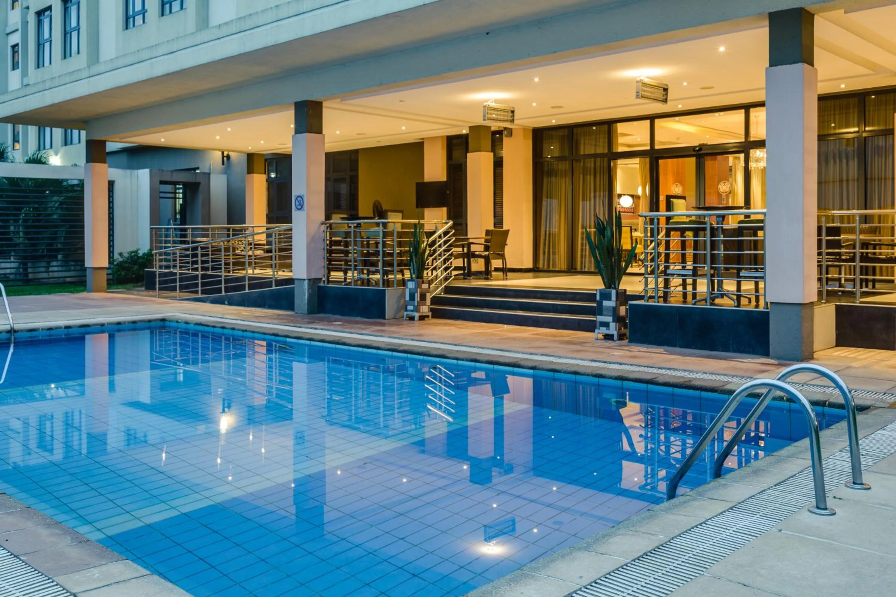 Swimming pool in Protea Hotel by Marriott Benin City Select Emotan