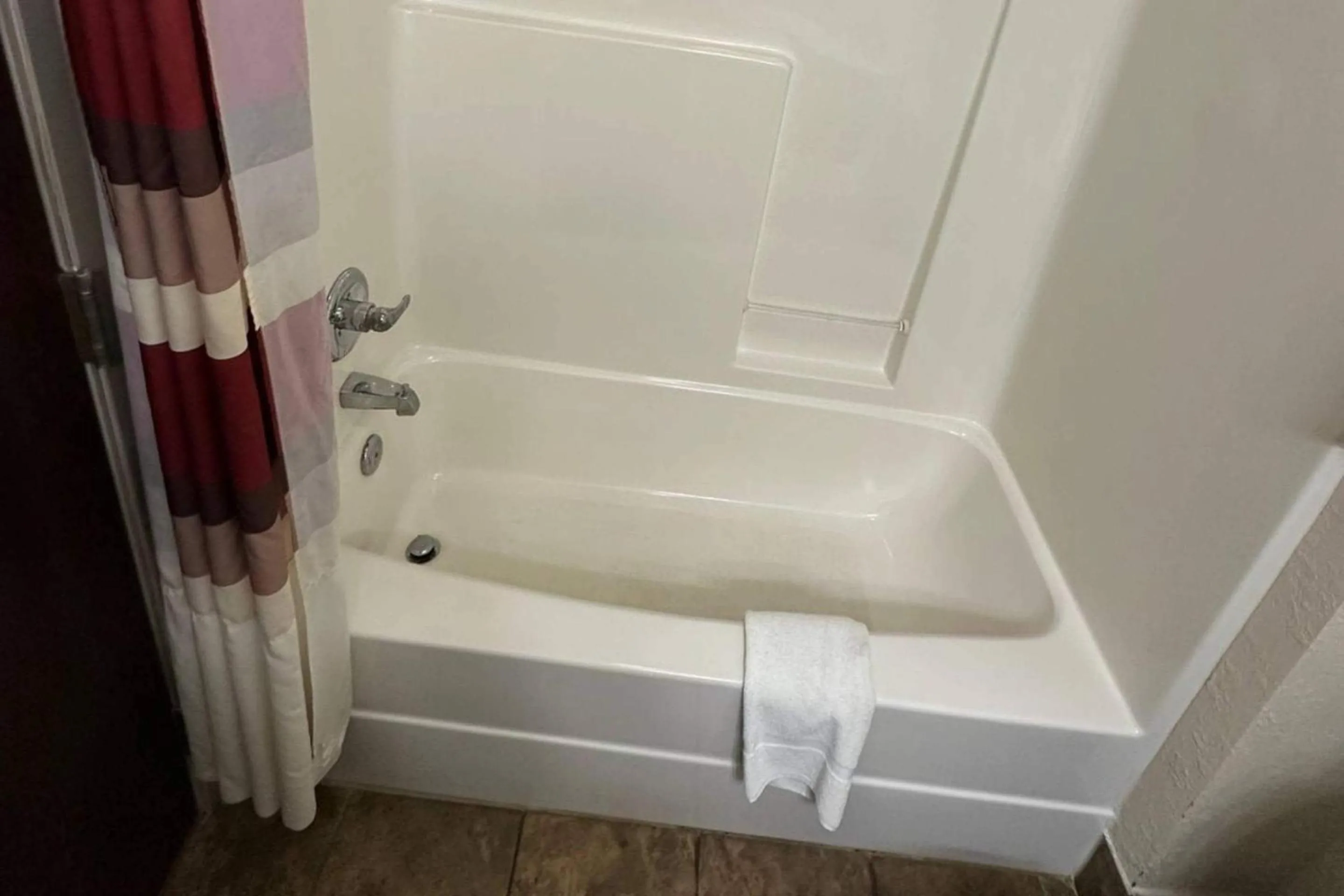 Bedroom in Econo Lodge Inn & Suites