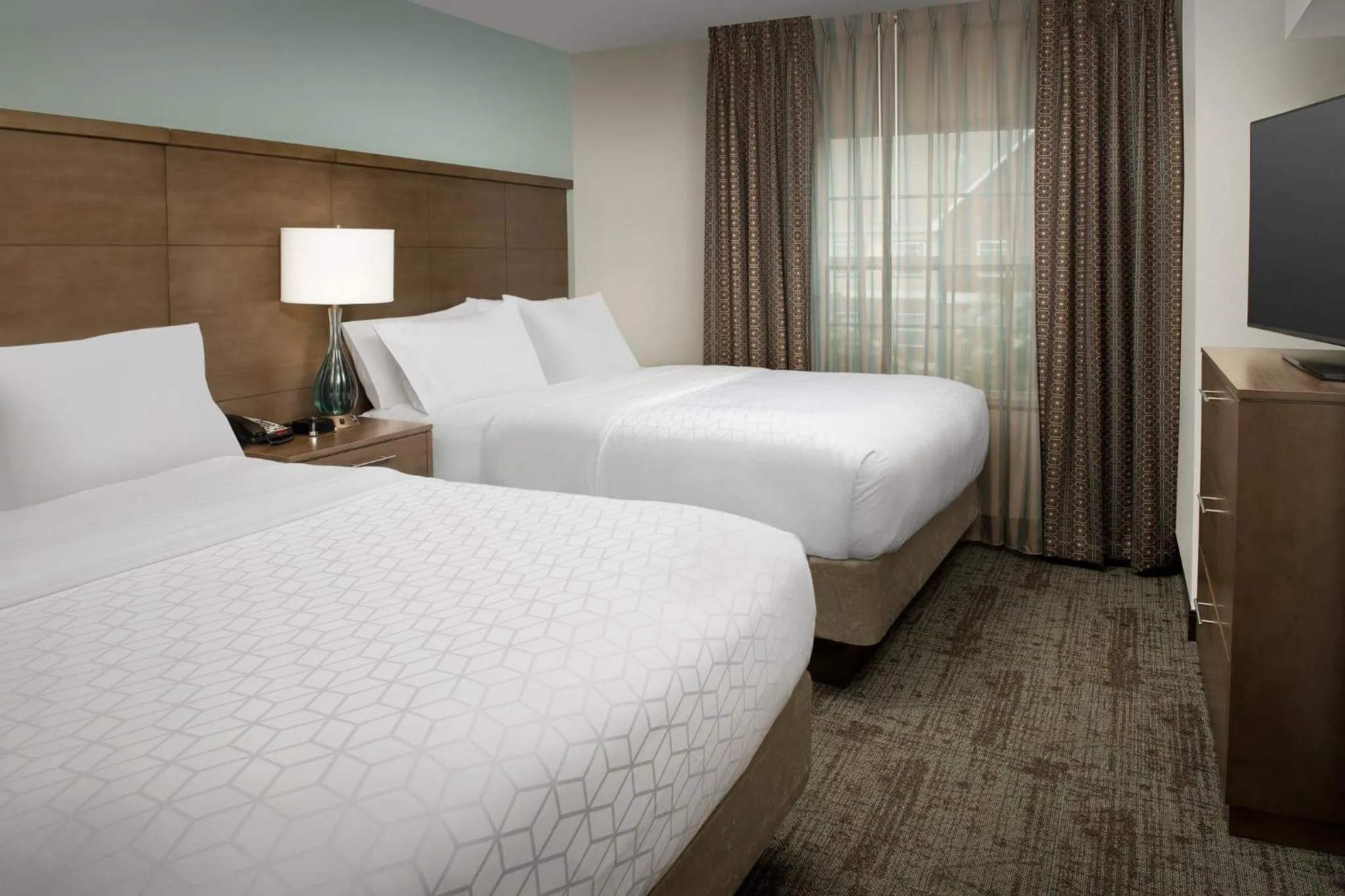 Photo of the whole room, Bed in Staybridge Suites Greenville I-85 Woodruff Road by IHG