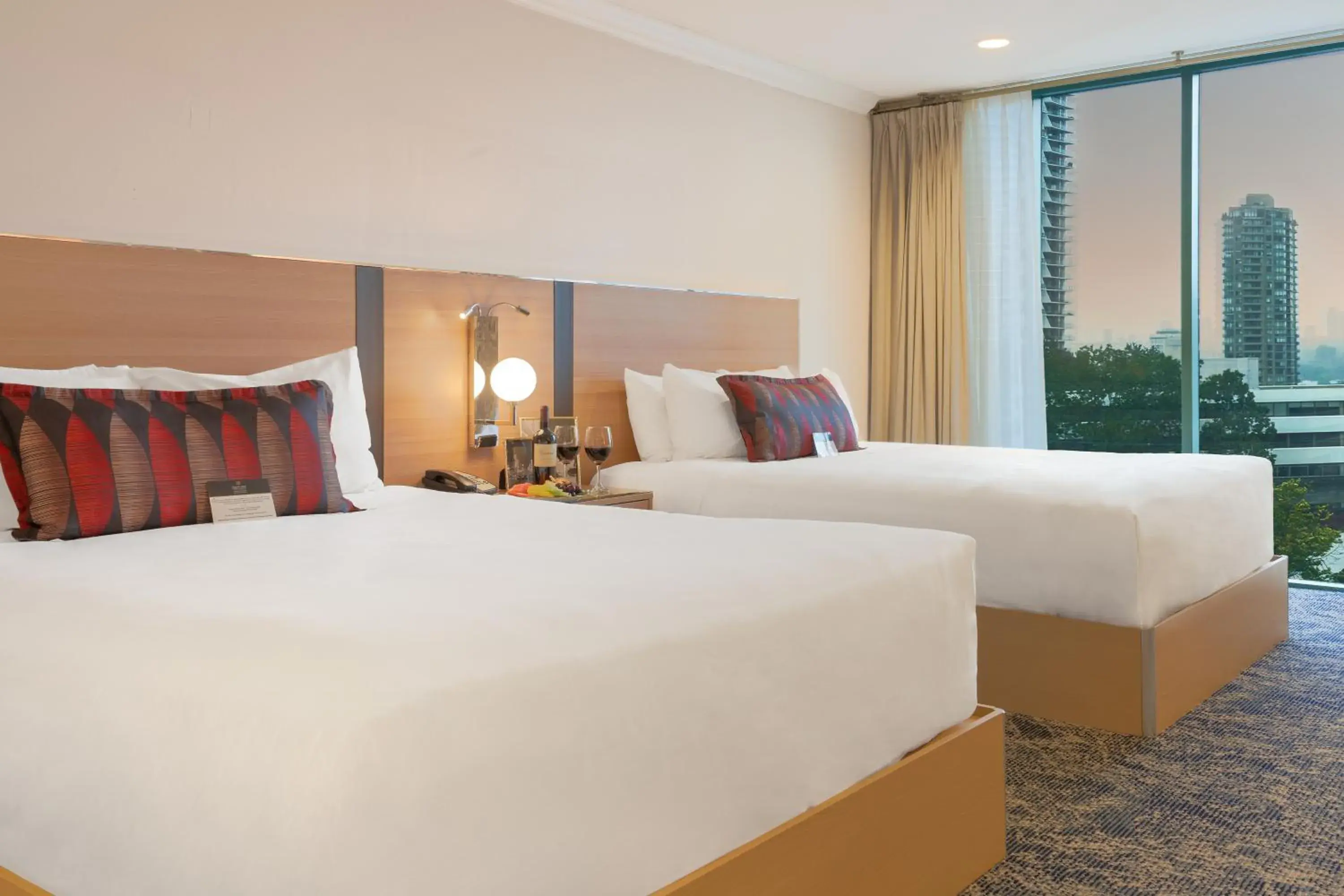 Bed in Executive Suites Hotel & Conference Center, Metro Vancouver Bed in Executive Suites Hotel & Conference Center, Metro Vancouver