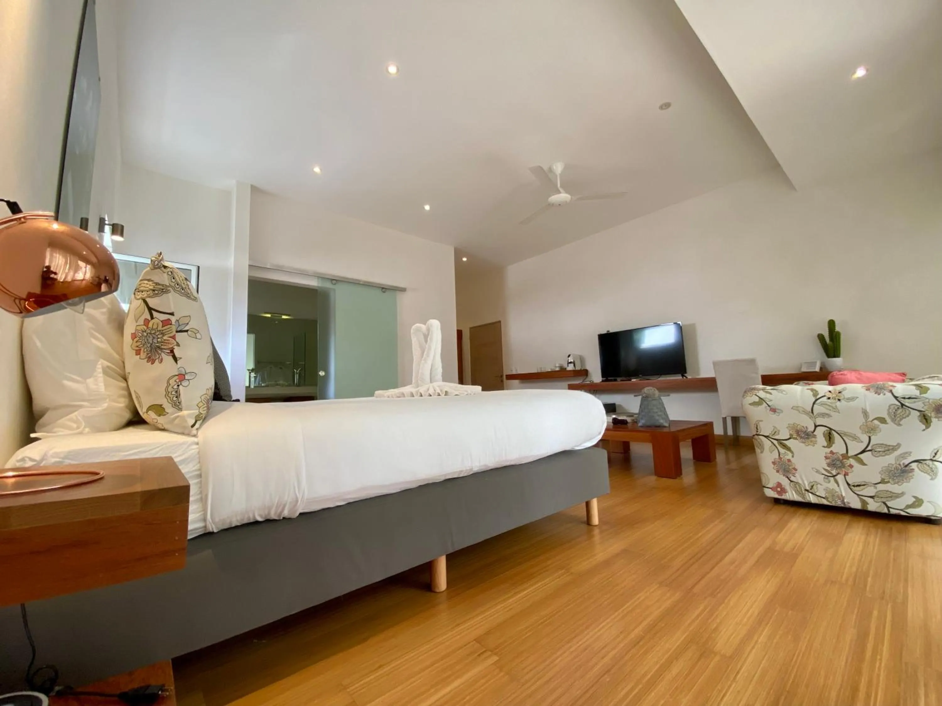 Bed in CASA-22 Luxury Boutique Hotel