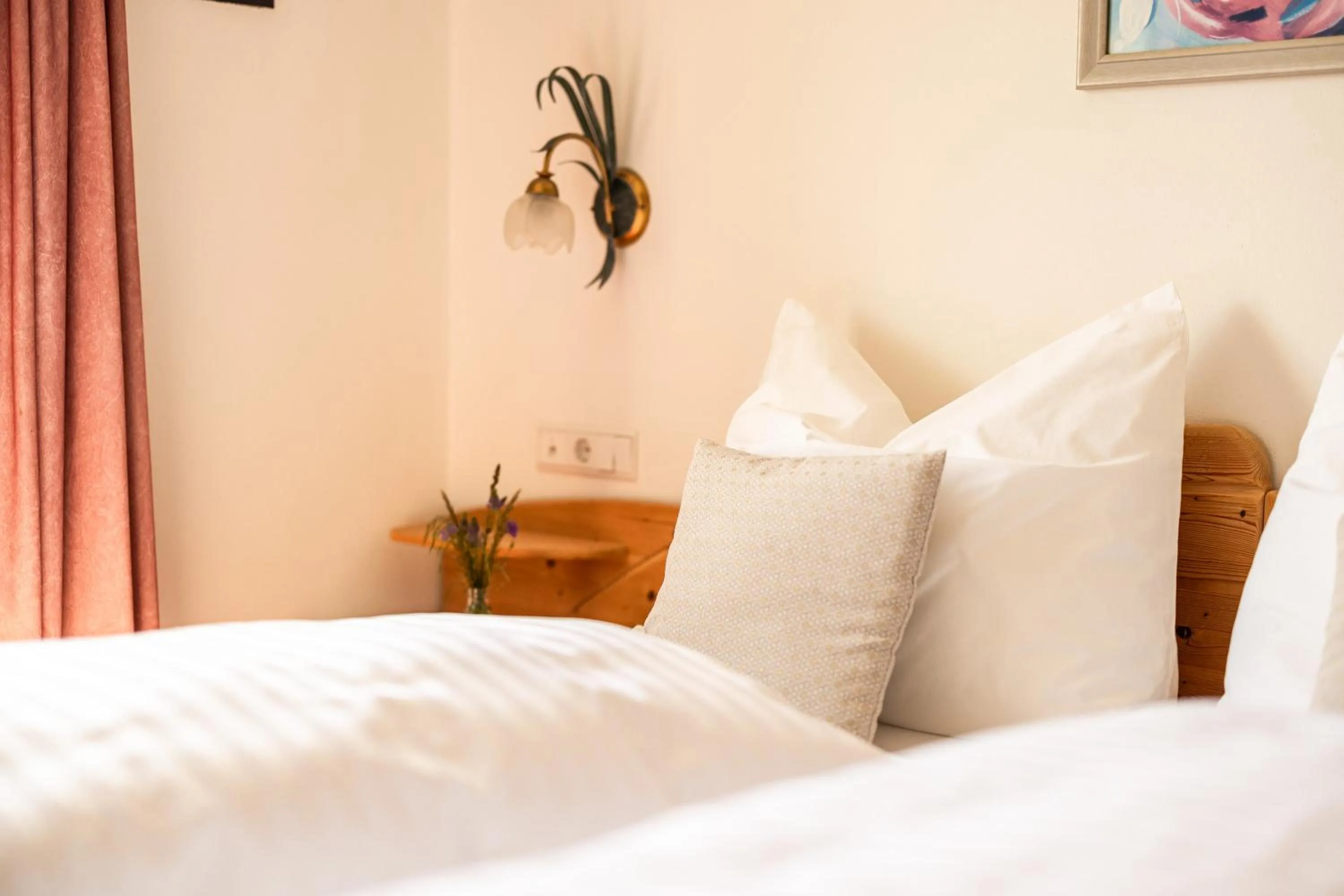 Bed in EGGER Apartments & Suites