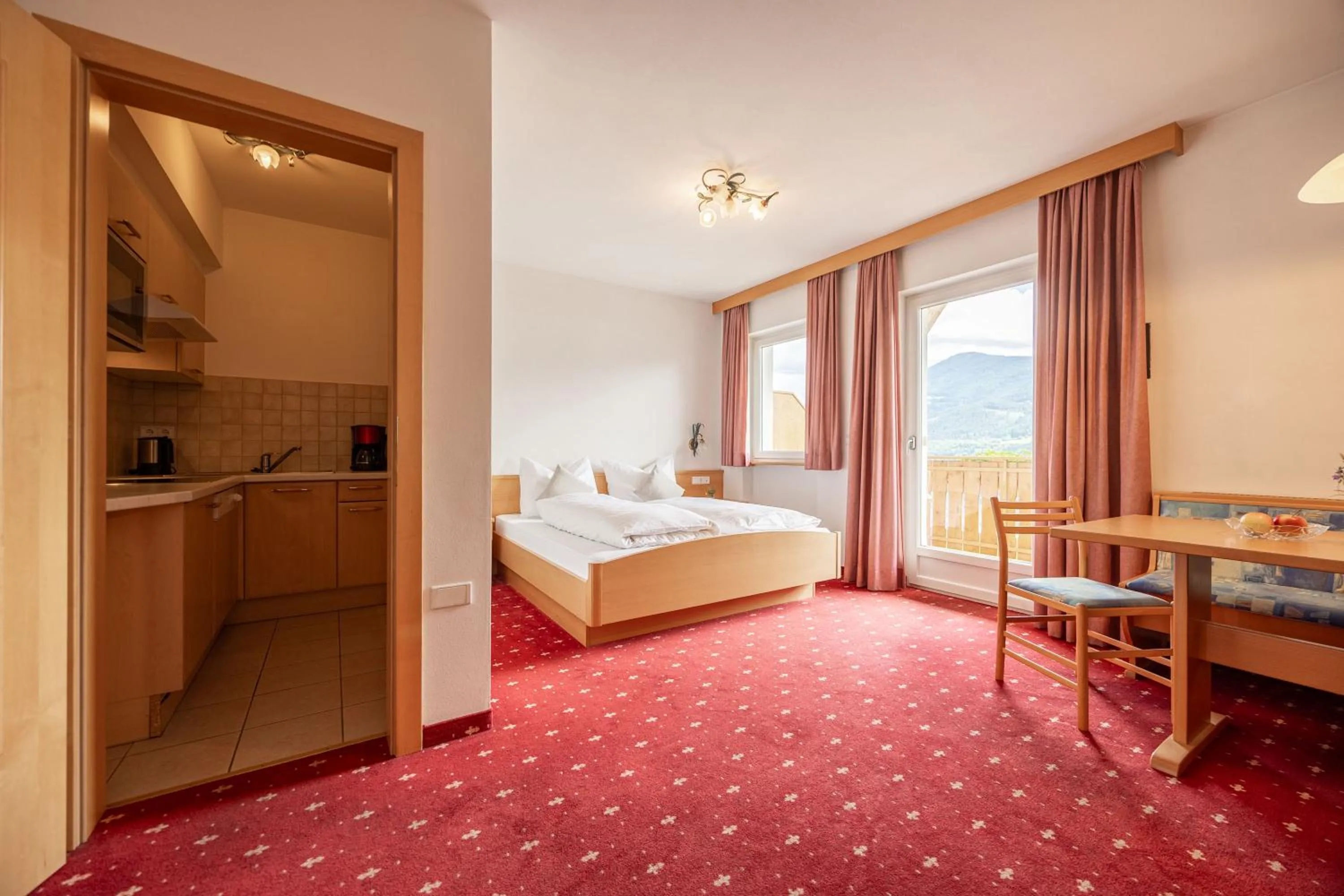 Photo of the whole room, Bed in EGGER Apartments & Suites