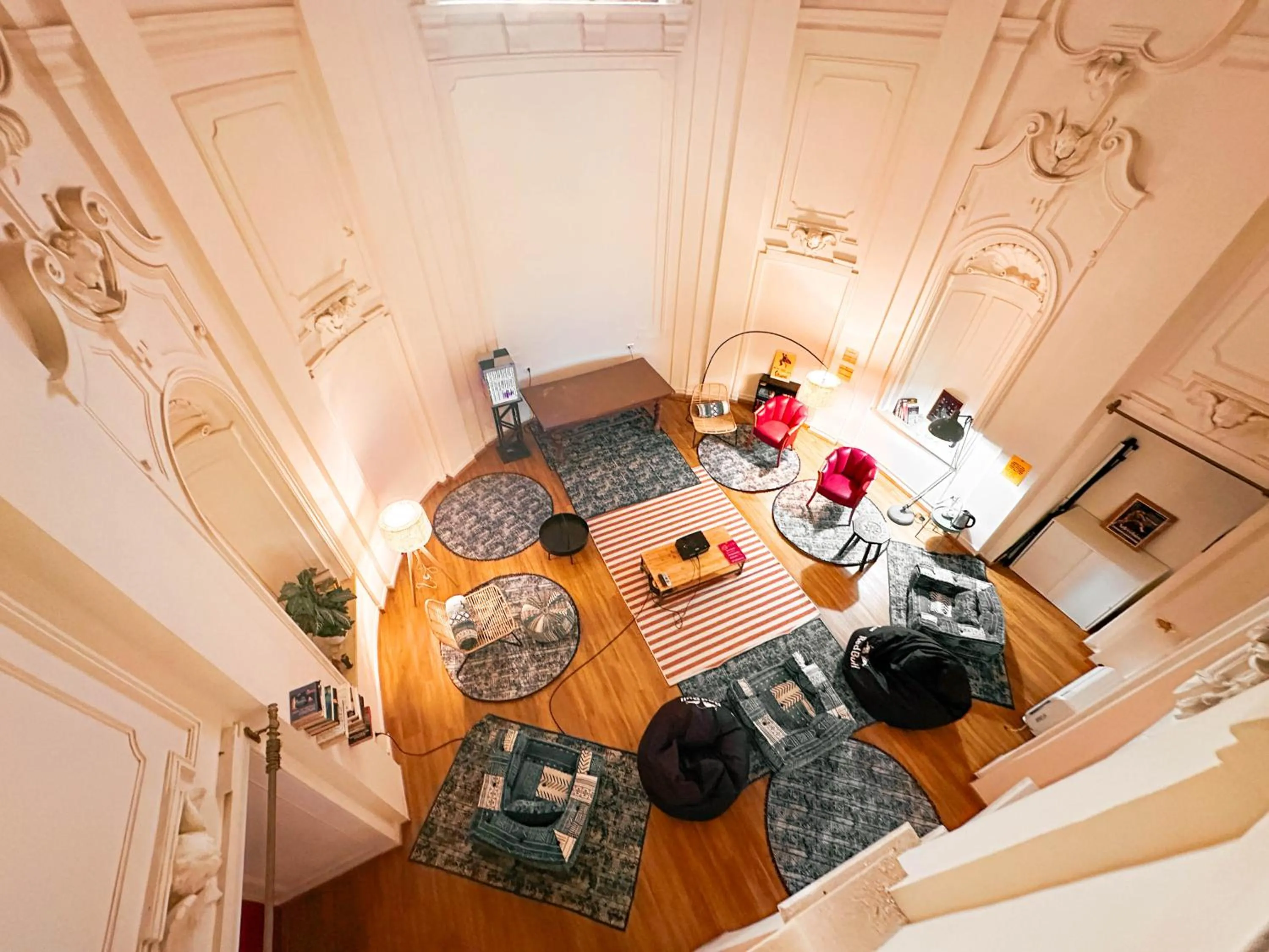 Seating area in Hotel Bello by Ostello Bello