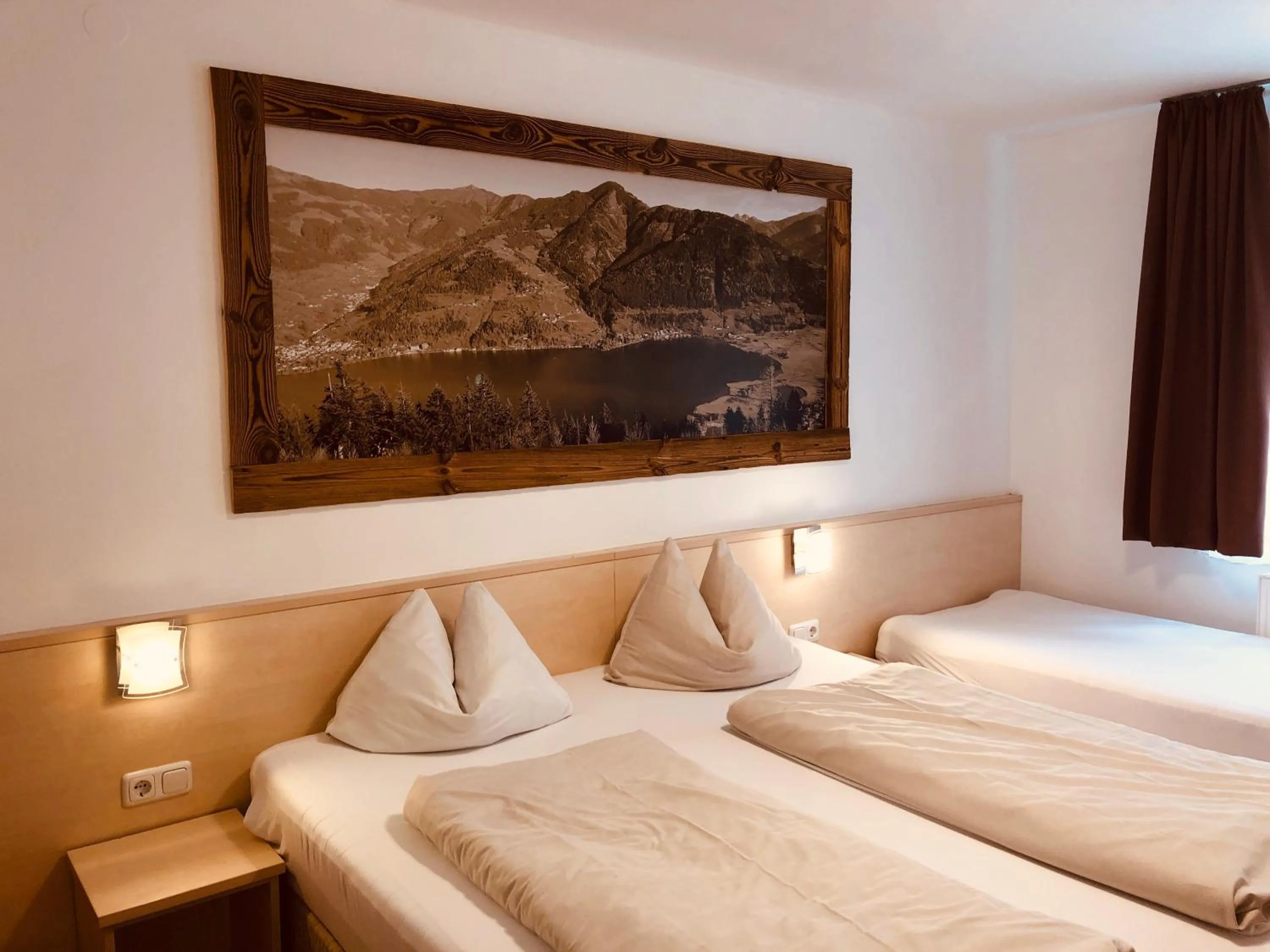 Bedroom, Bed in Familienappartements Eder - Free entry to Tauern SPA Kaprun included