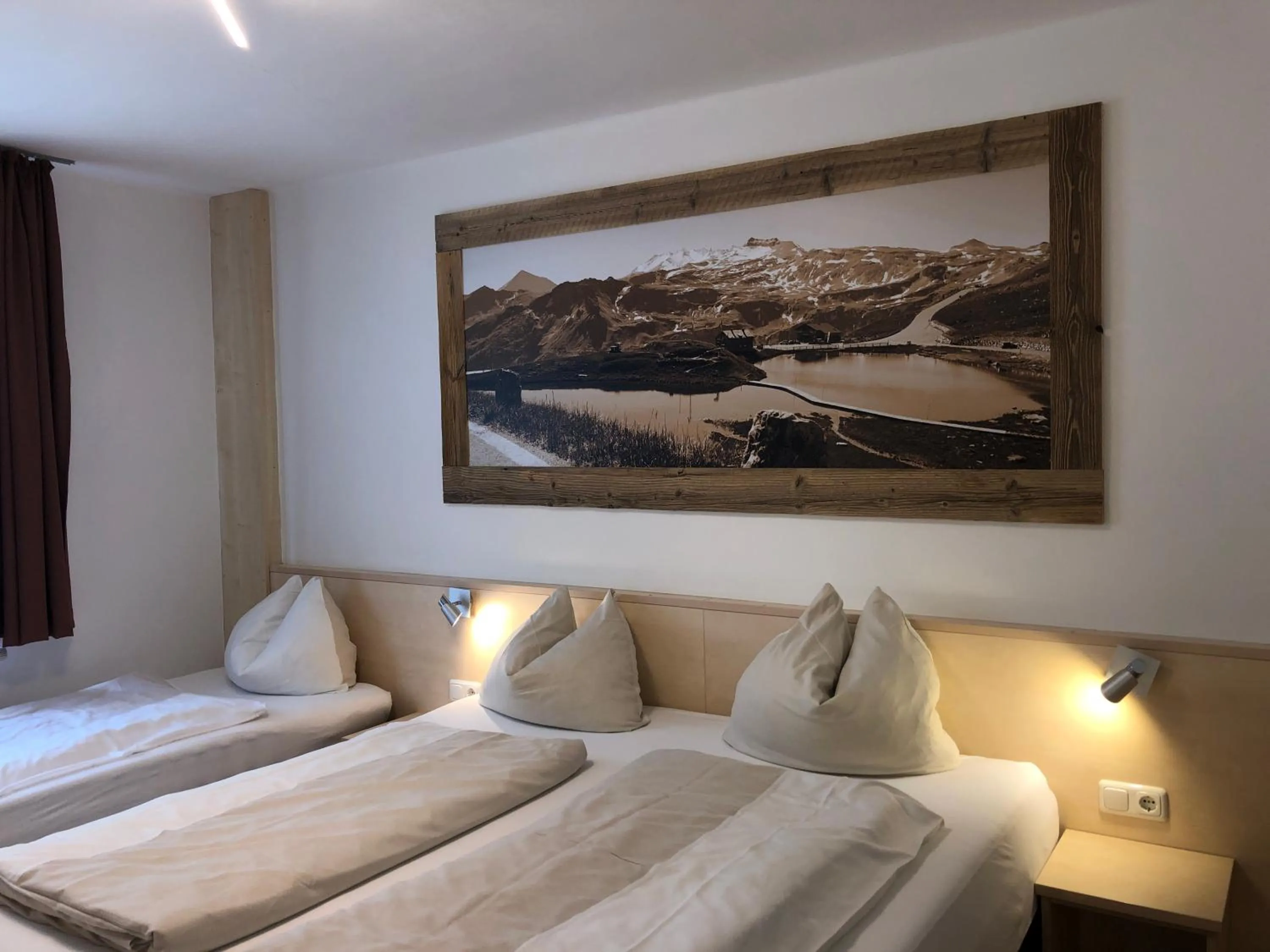 Bedroom, Bed in Familienappartements Eder - Free entry to Tauern SPA Kaprun included
