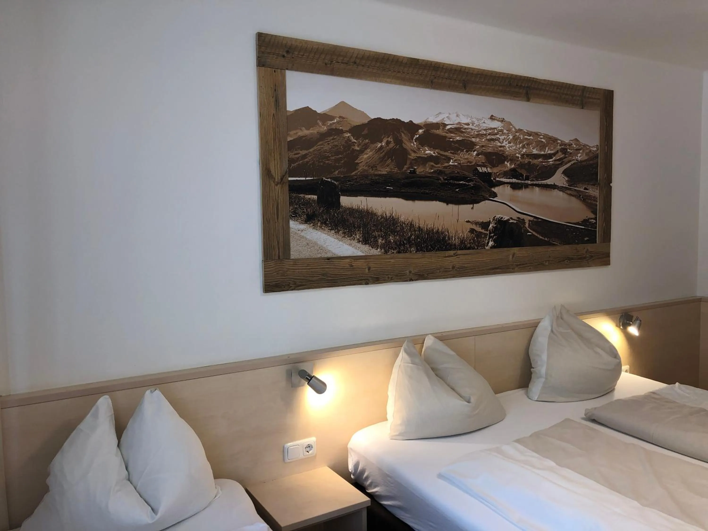 Bedroom, Bed in Familienappartements Eder - Free entry to Tauern SPA Kaprun included