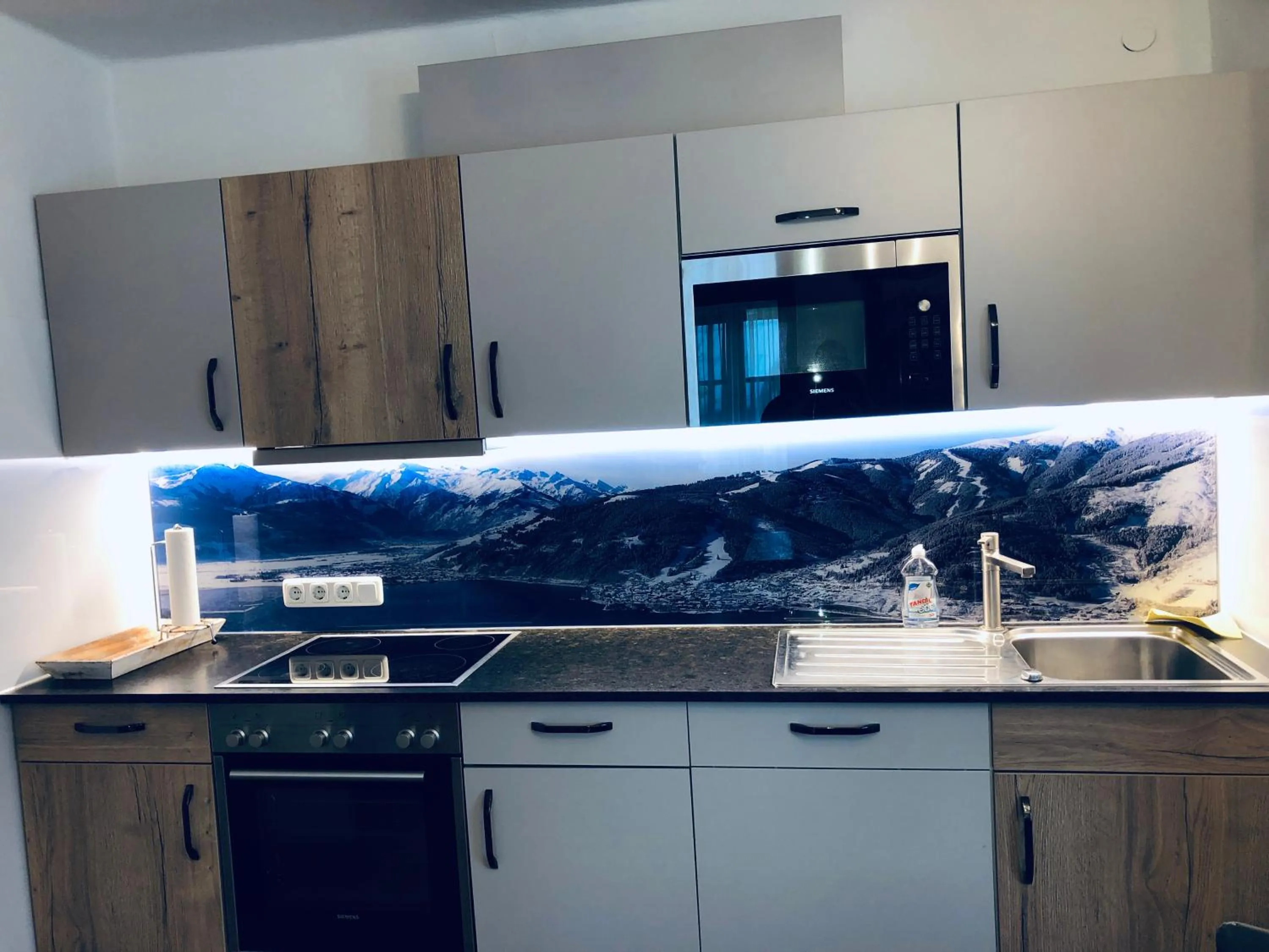 Kitchen or kitchenette in Familienappartements Eder - Free entry to Tauern SPA Kaprun included