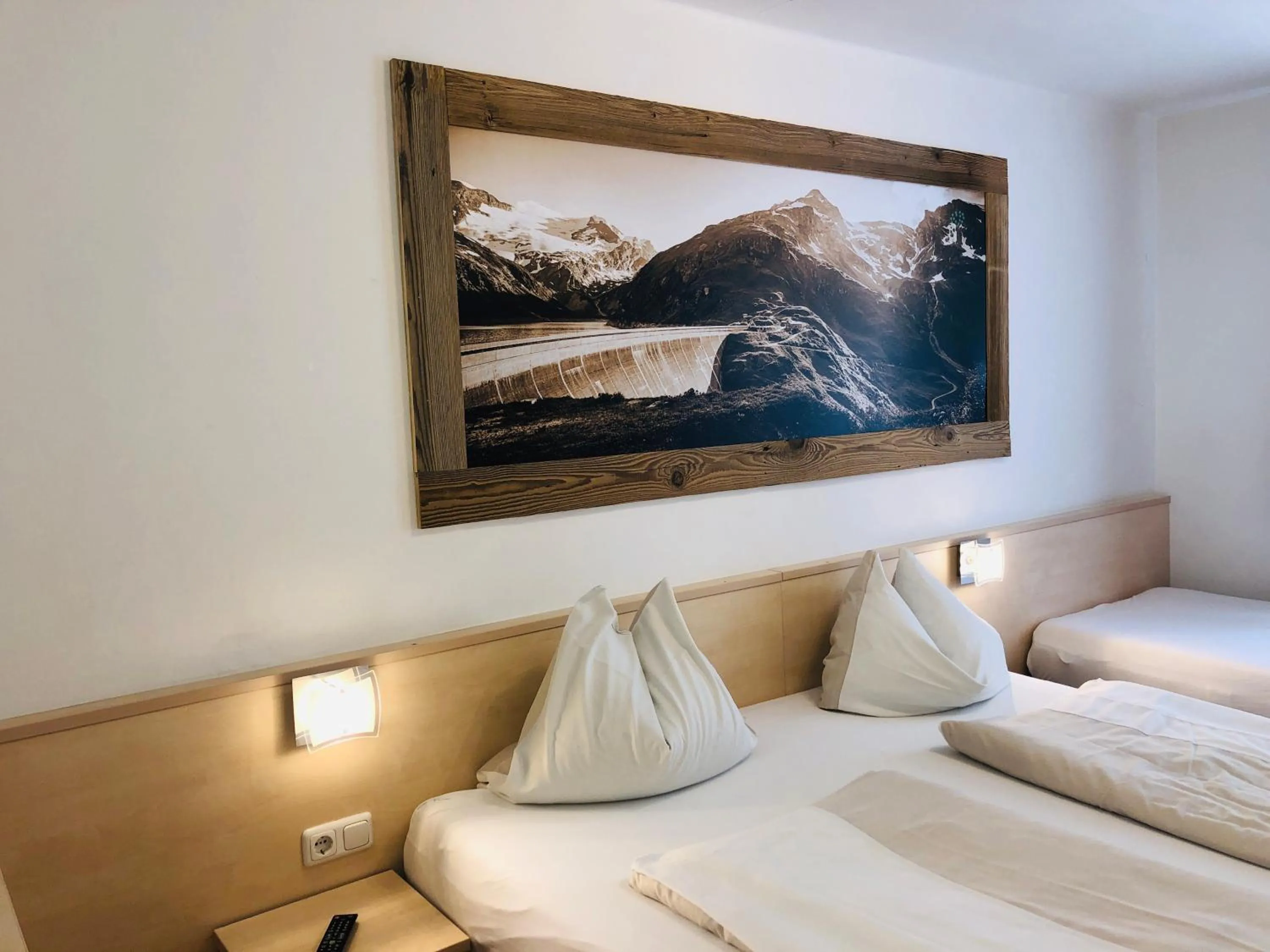 Bedroom, Bed in Familienappartements Eder - Free entry to Tauern SPA Kaprun included