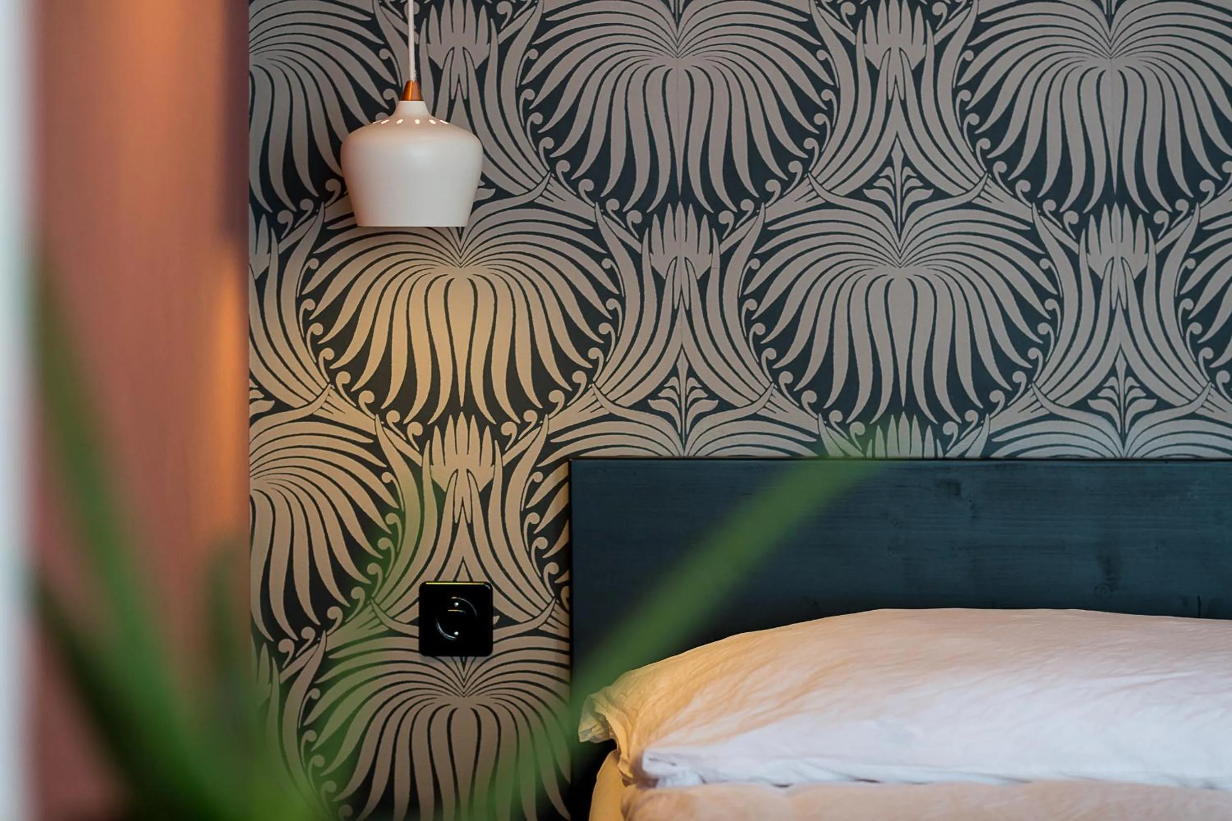 Bed in ADLER Boutique Hotel