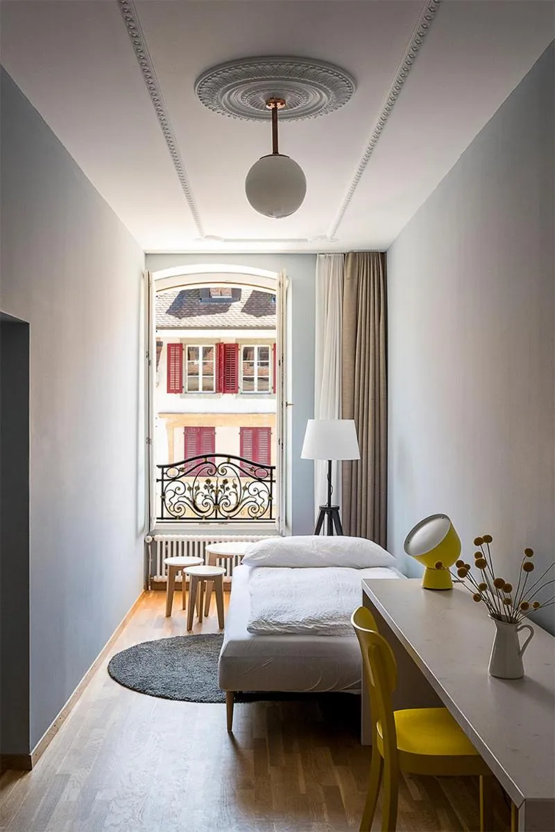 Bed in ADLER Boutique Hotel