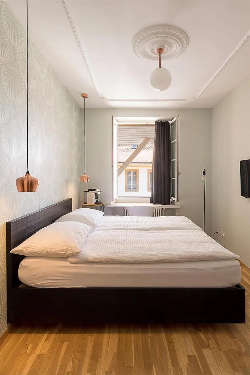 Bed in ADLER Boutique Hotel