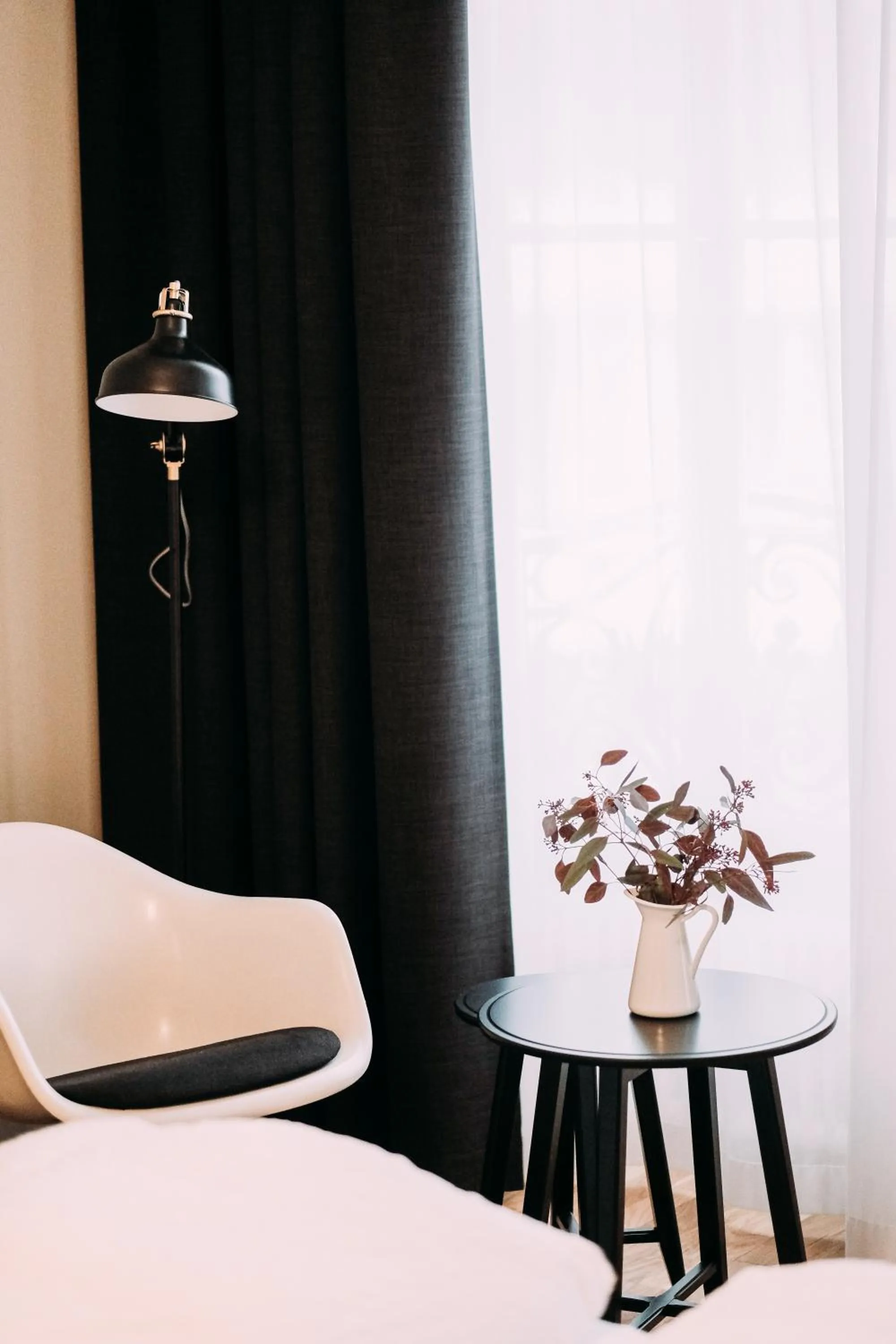 Seating area, Bed in ADLER Boutique Hotel