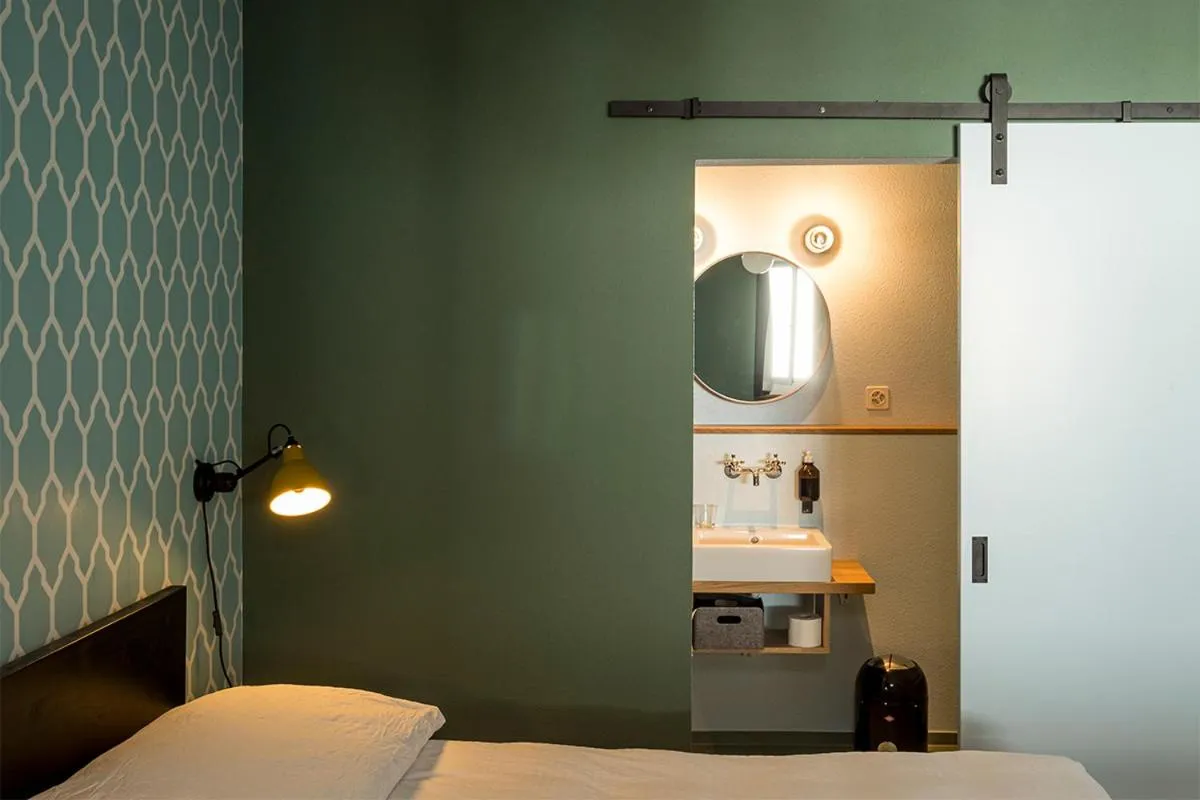 Bathroom, Bed in ADLER Boutique Hotel