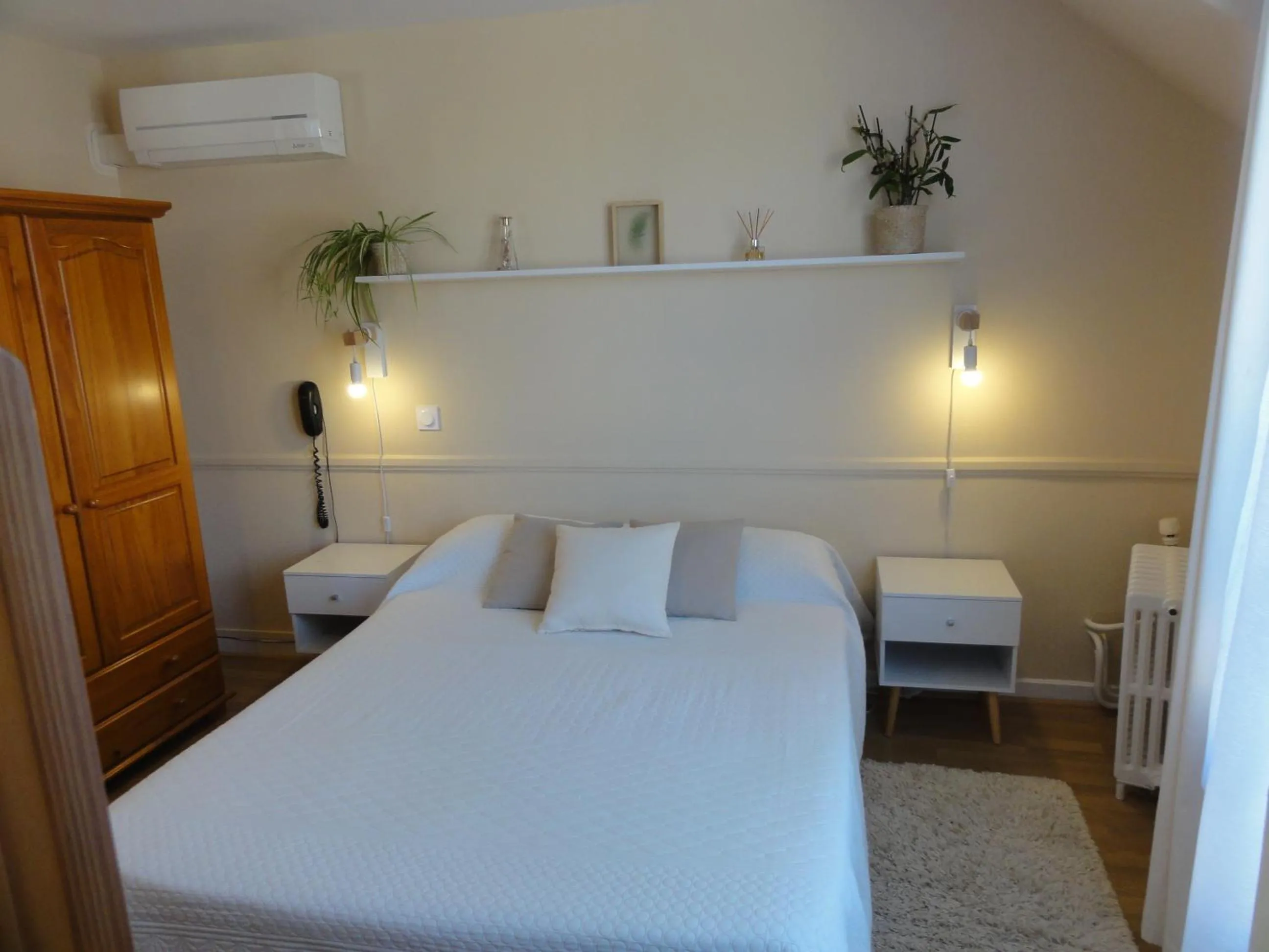 Bed in Hotel des Voyageurs