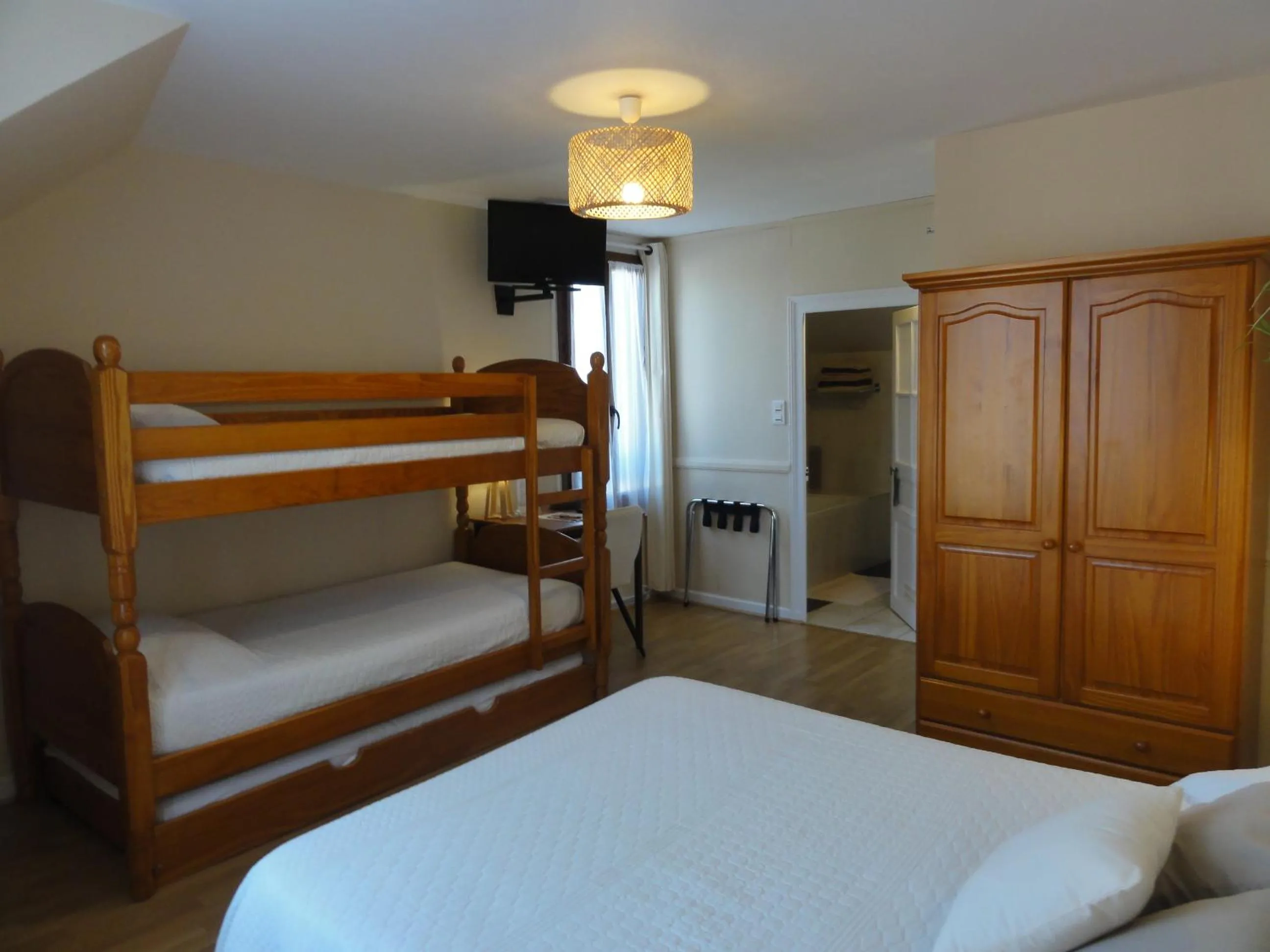 Bed in Hotel des Voyageurs
