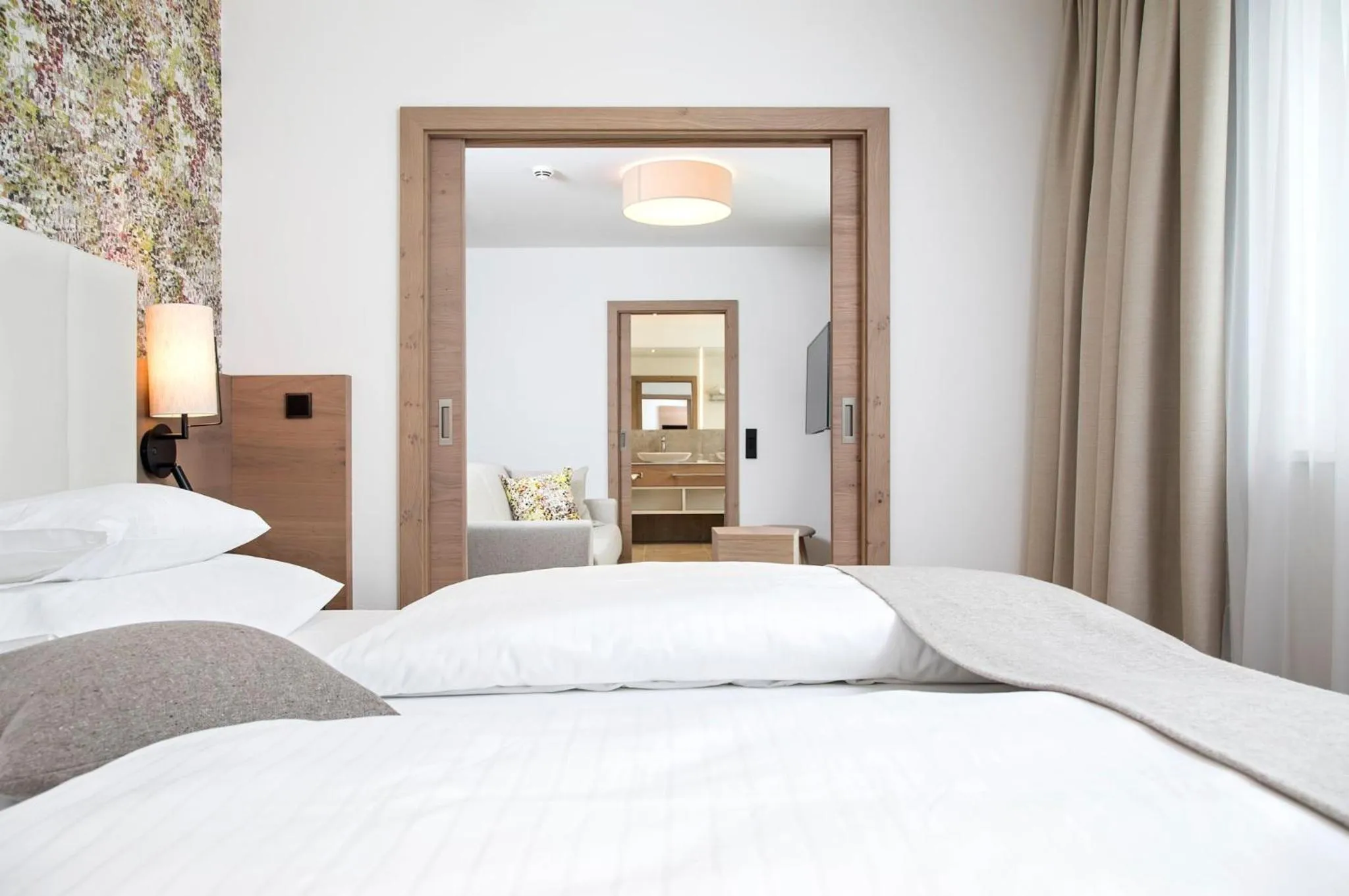 Photo of the whole room, Bed in Das Hohe Salve Sportresort, 4 Sterne Superior