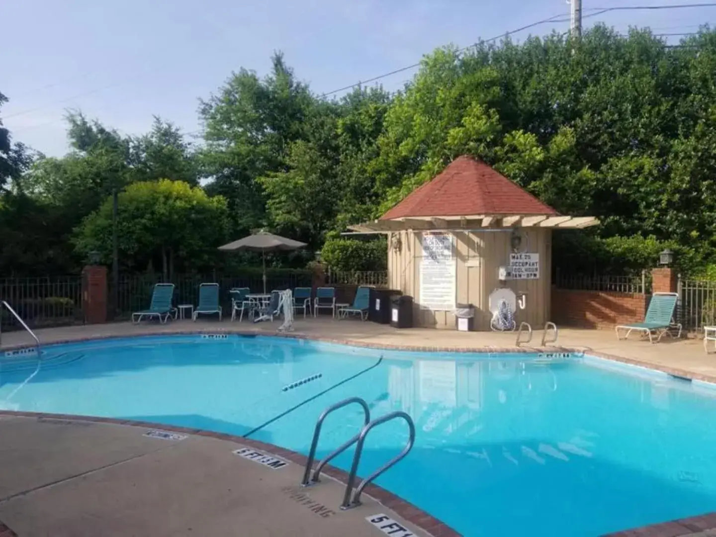 Swimming pool in Ramada by Wyndham Gainesville Swimming pool in Ramada by Wyndham Gainesville