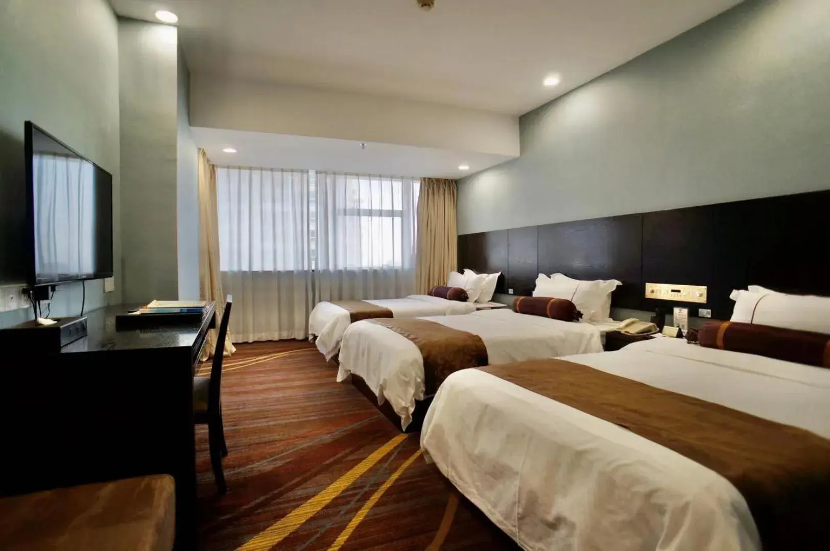 Deluxe Triple Room in Skyline Plaza Hotel Guangzhou Deluxe Triple Room in Skyline Plaza Hotel Guangzhou