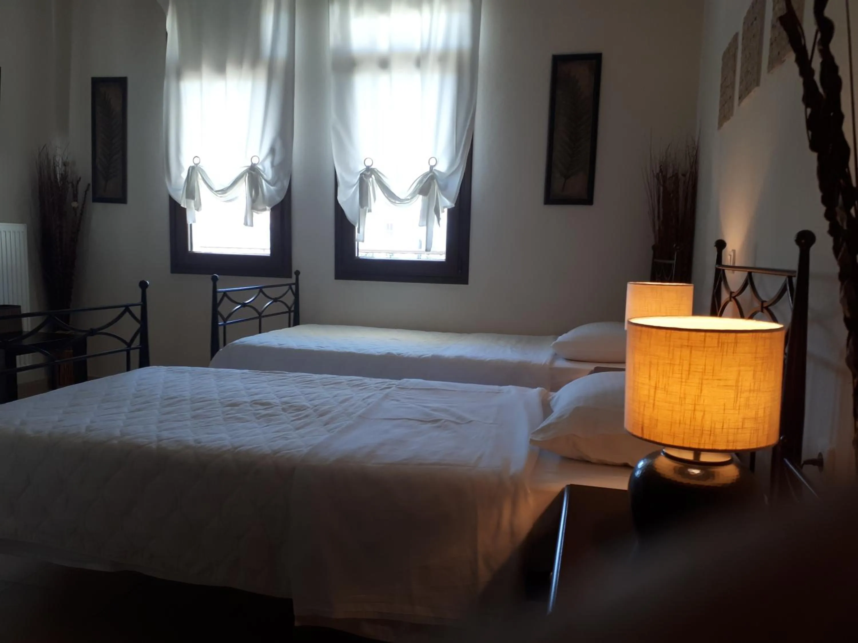 Bed in Villa Del Lago Boutique Hotel