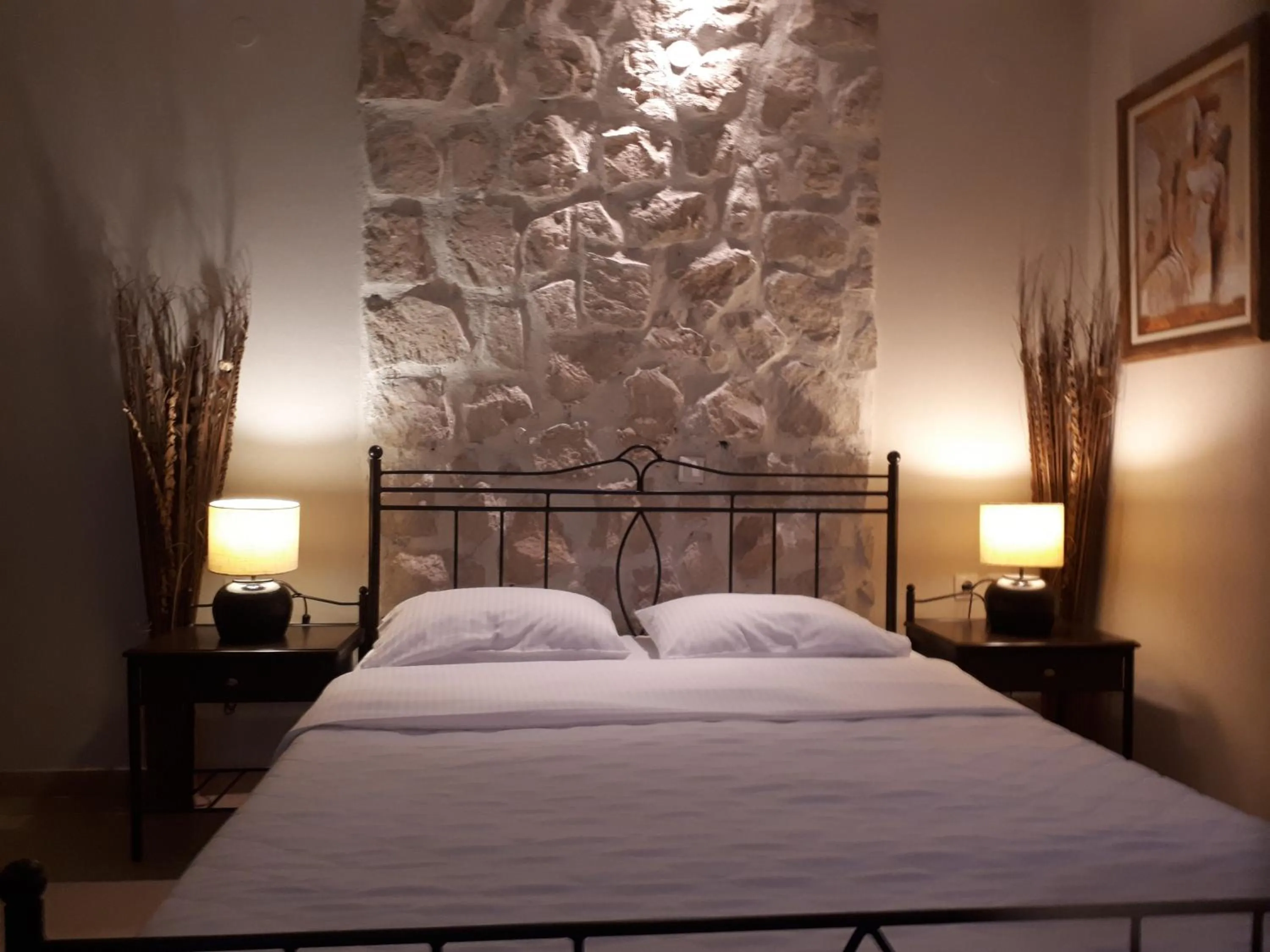 Bed in Villa Del Lago Boutique Hotel