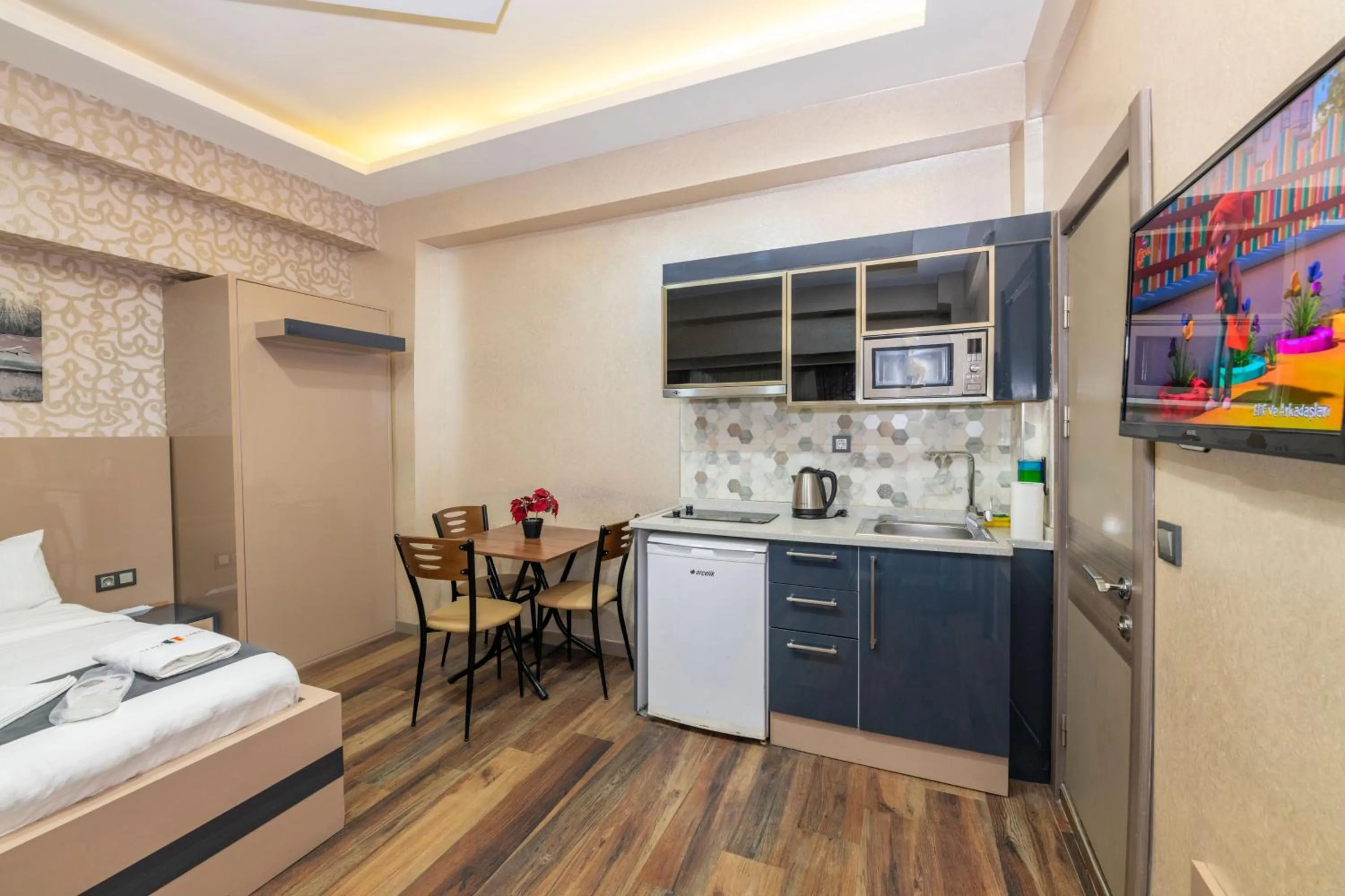 Kitchen or kitchenette, Bed in Taxim Trend Apart