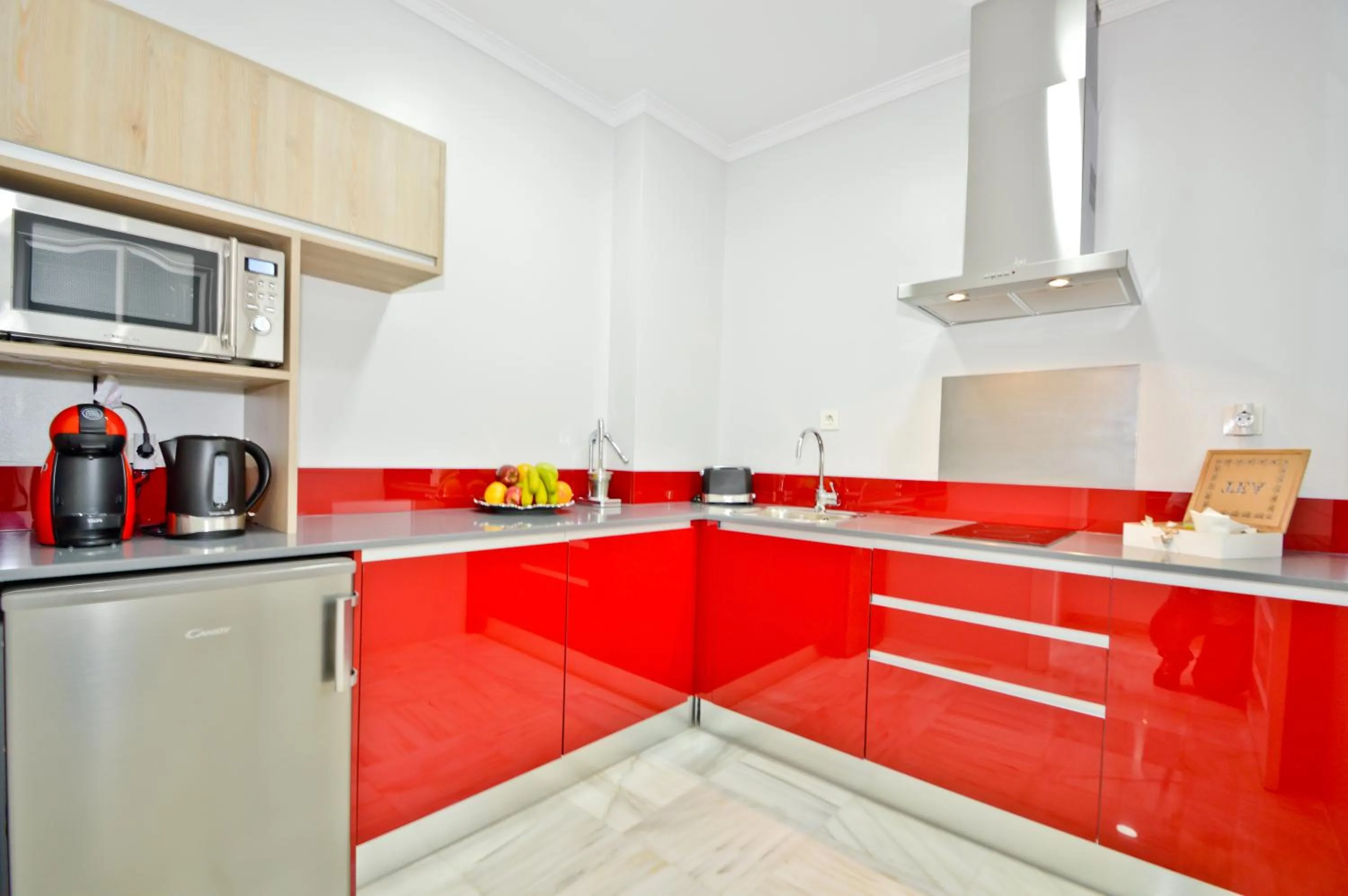 Kitchen or kitchenette in The Zentral Arenal Suites