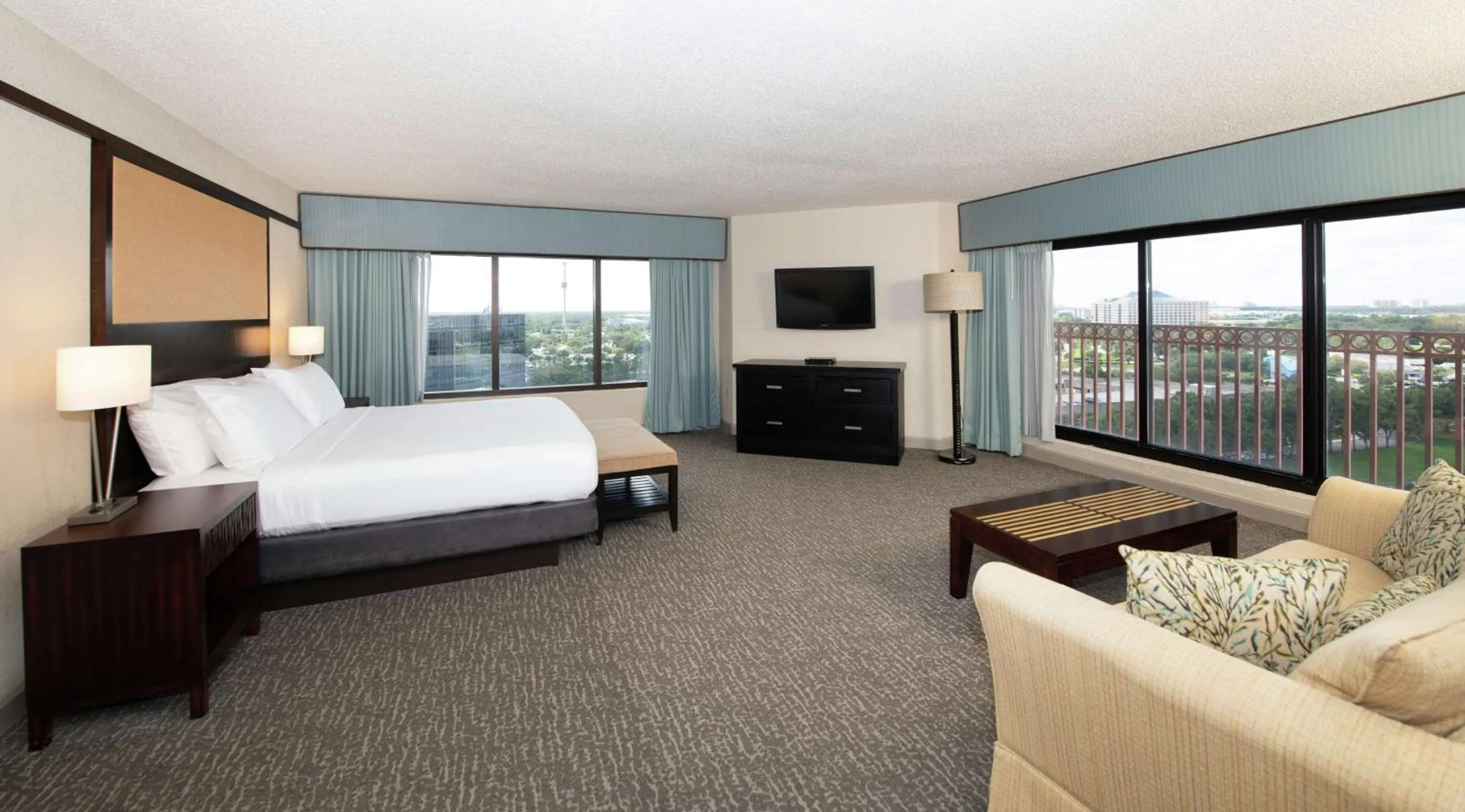 Living room, Bed in DoubleTree by Hilton Hotel Orlando at SeaWorld