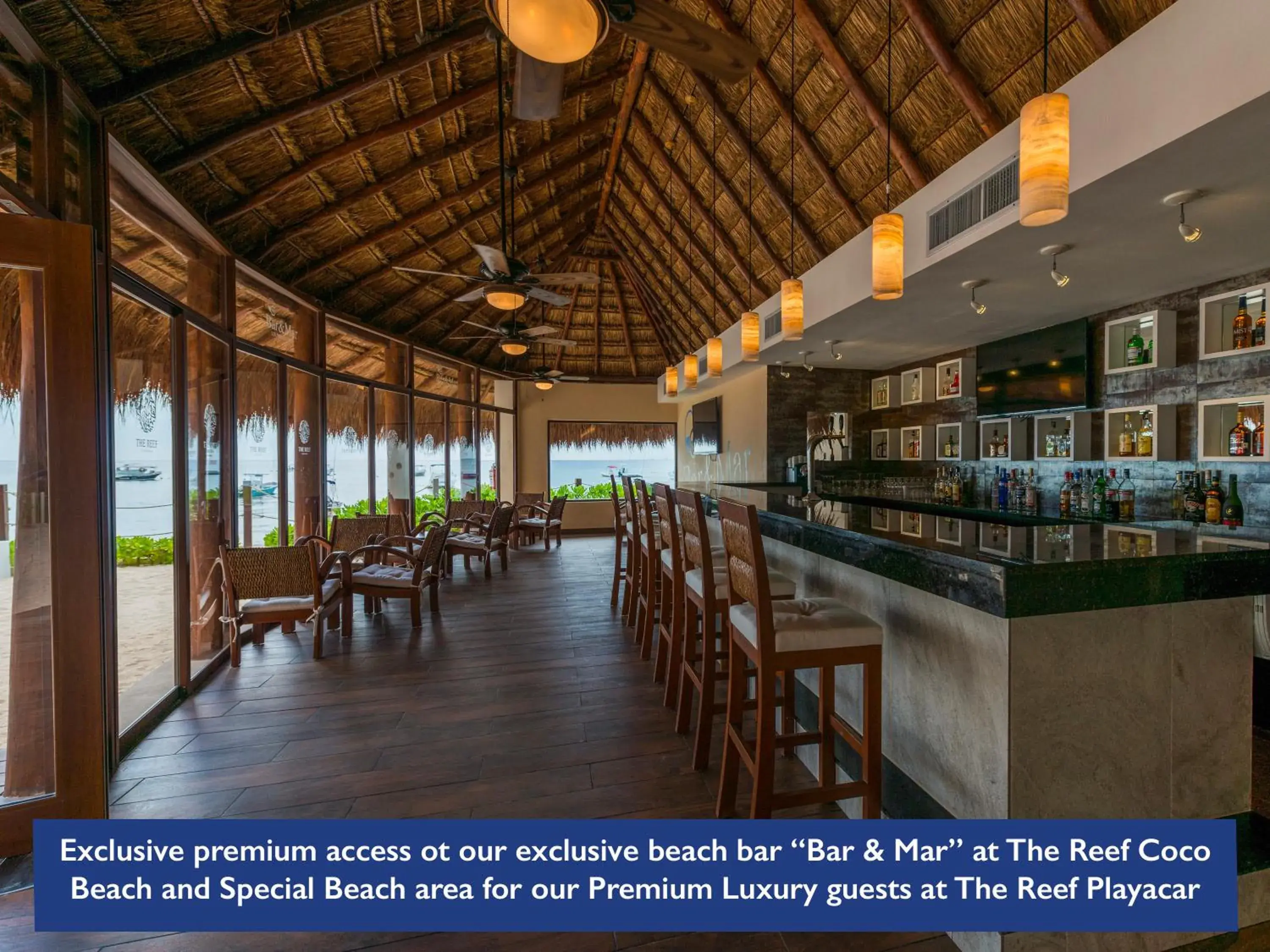 Lounge or bar in The Reef Coco Beach Resort & Spa- Optional All Inclusive Lounge or bar in The Reef Coco Beach Resort & Spa- Optional All Inclusive