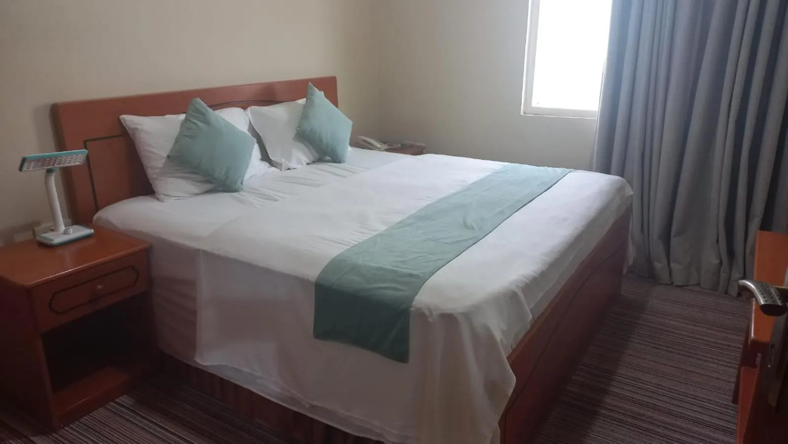 Bed in Al Jazeerah Hotel