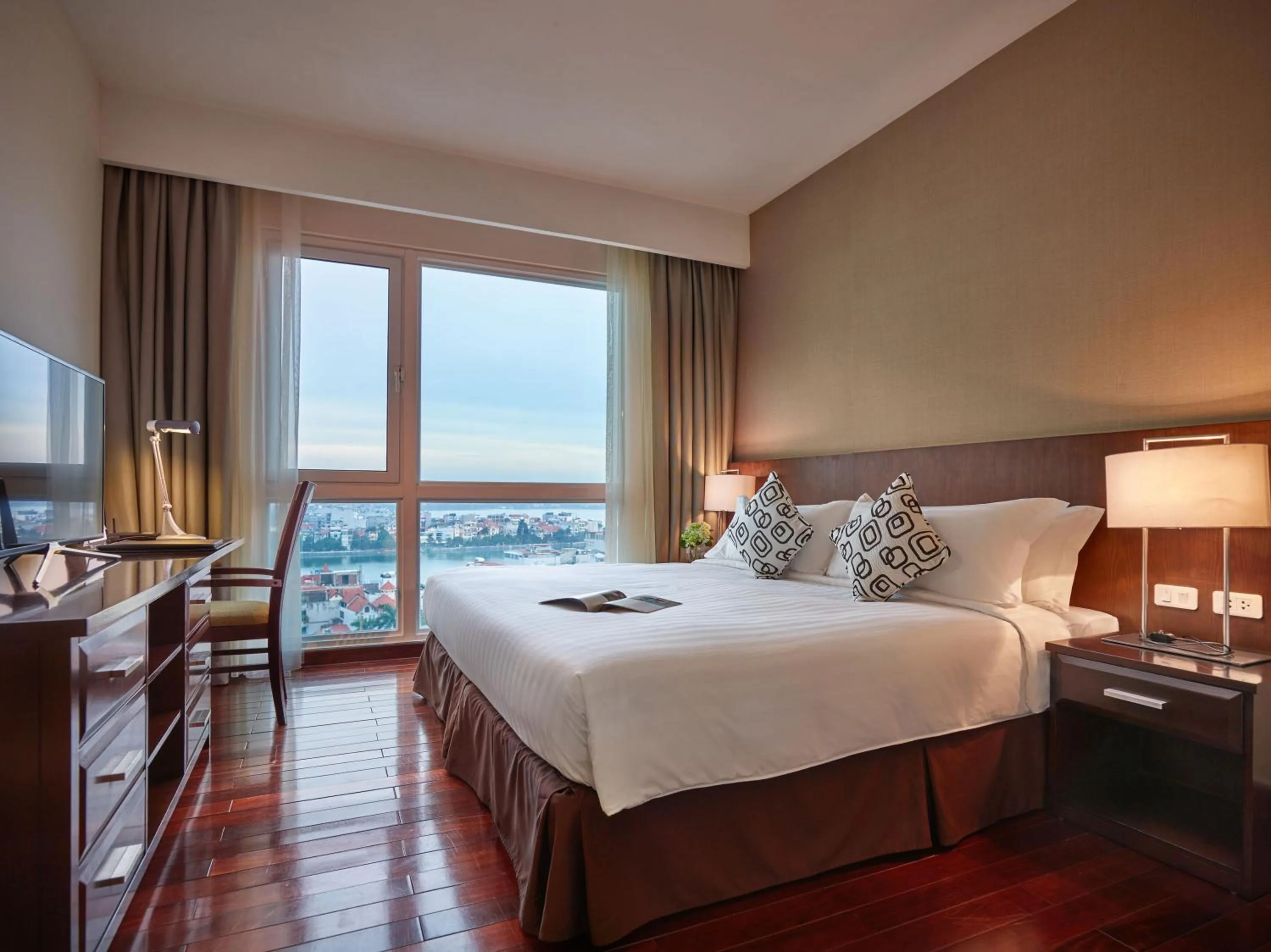 Photo of the whole room, Bed in Fraser Suites Hanoi