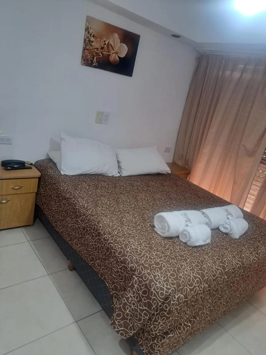 Bed in San Remo Grand Hotel